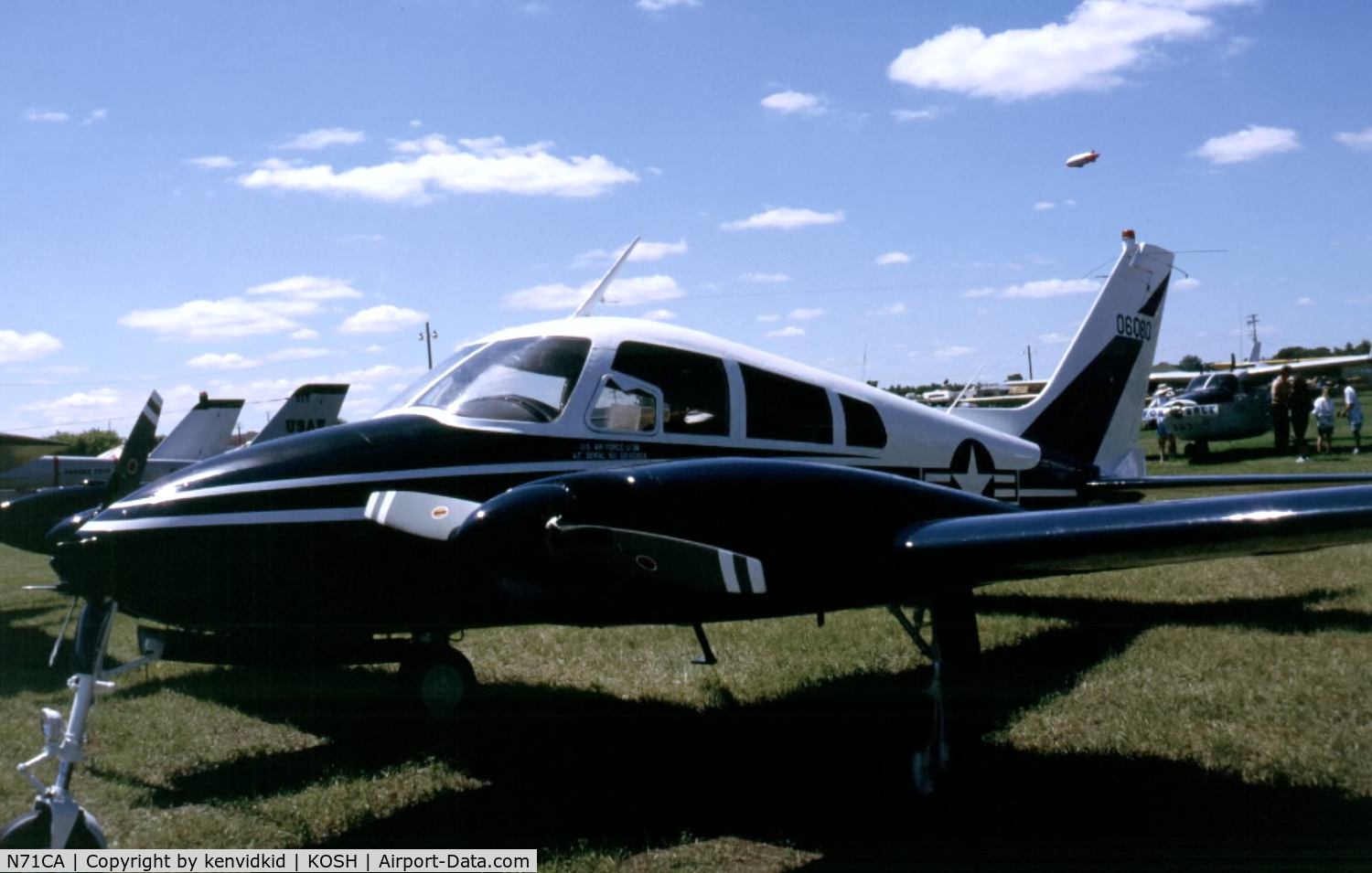 N71CA, Cessna U-3B (310M) C/N 310M-0035, At Air Adventure 1993 Oshkosh.
