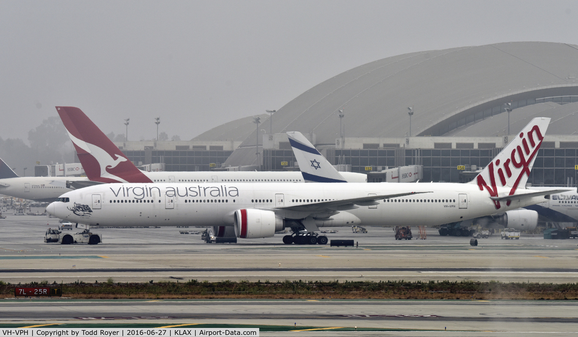 VH-VPH, 2010 Boeing 777-3ZG/ER C/N 37943, Getting towed to parking at LAX