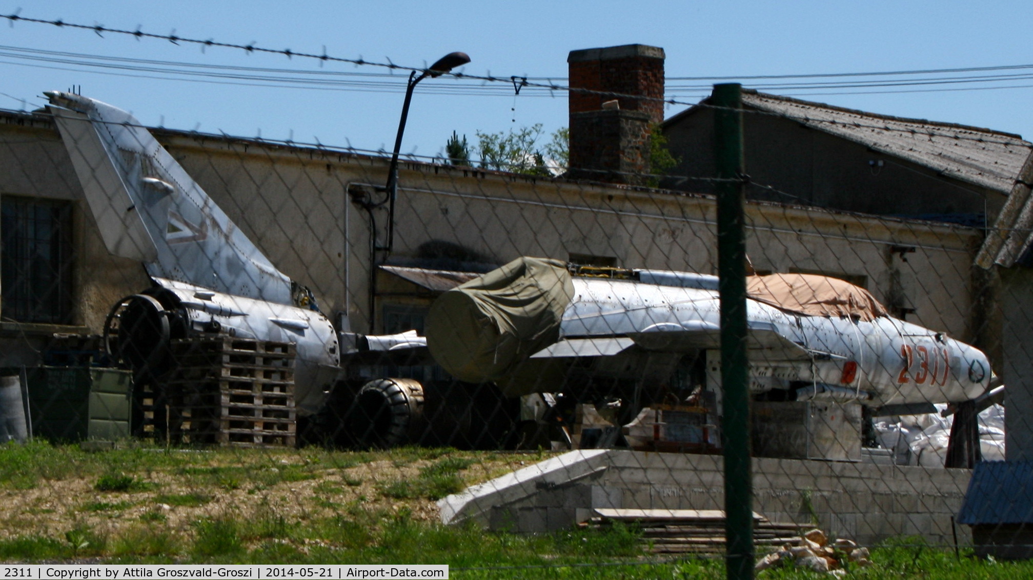 2311, 1962 Mikoyan-Gurevich MiG-21F-13 C/N 742311, Kövesgyür-puszta, Hungary. A collector's site
