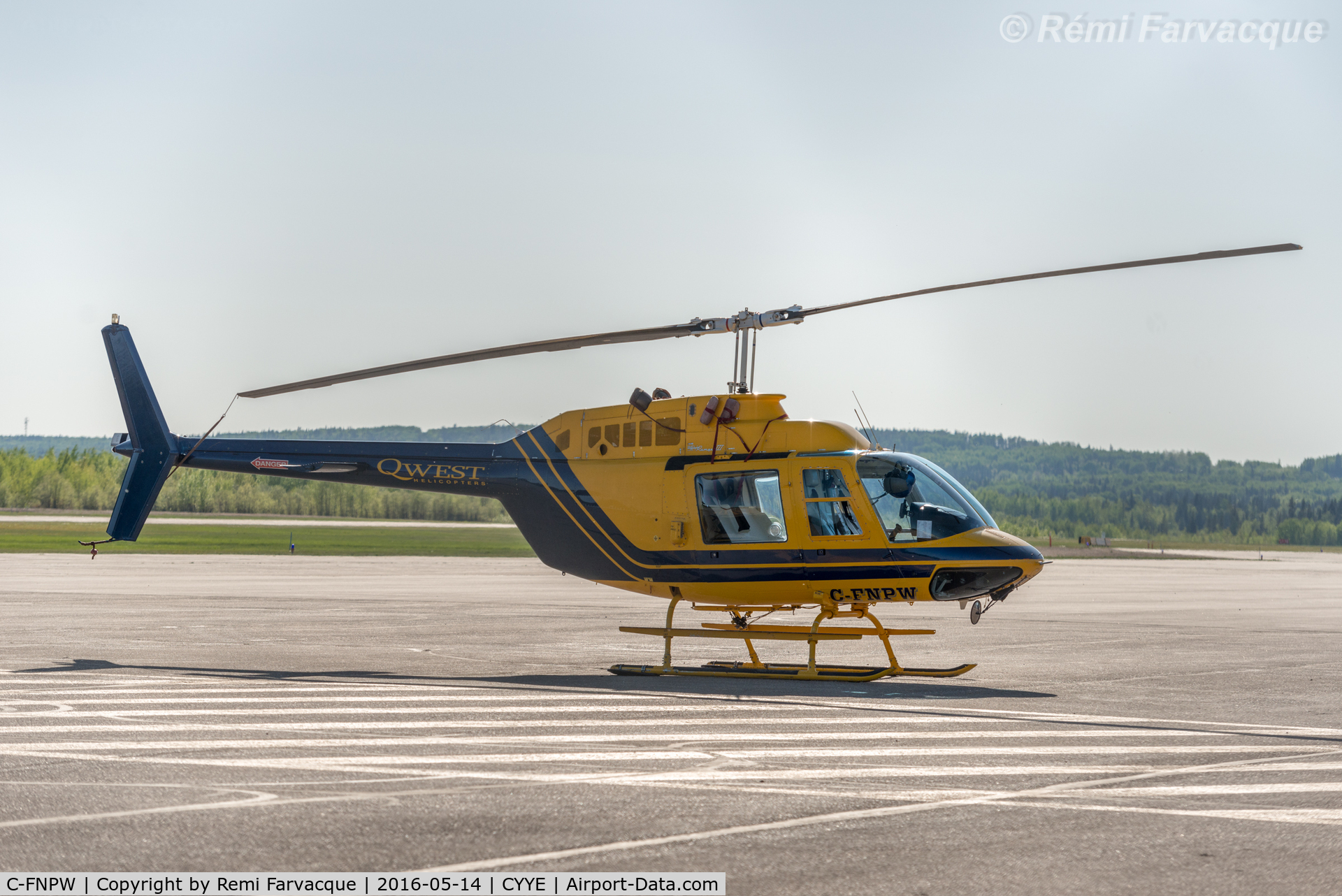 C-FNPW, 1975 Bell 206B JetRanger II C/N 1690, Parked outside Qwest Helicopters hangar.