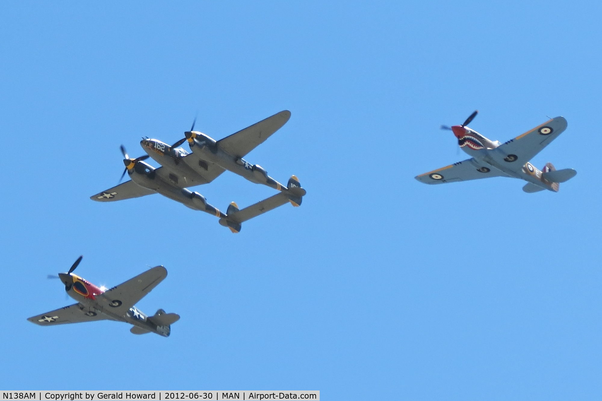N138AM, 1943 Lockheed P-38J Lightning C/N 44-23314, P-38J in formation flyover during Nampa Airport airshow.