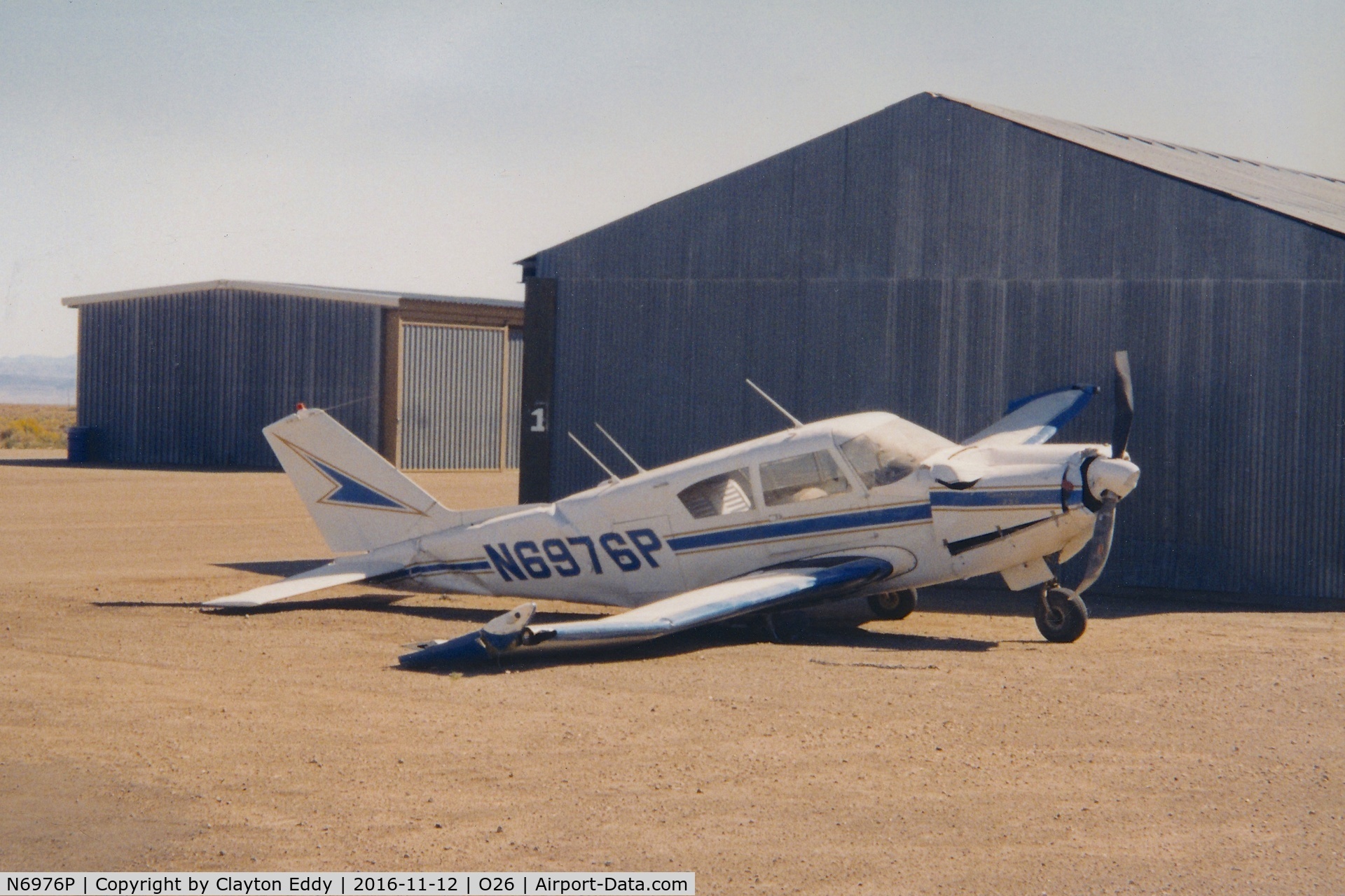 N6976P, Piper PA-24-250 Comanche C/N 242119, Lone Pine Airport. 1990's?
