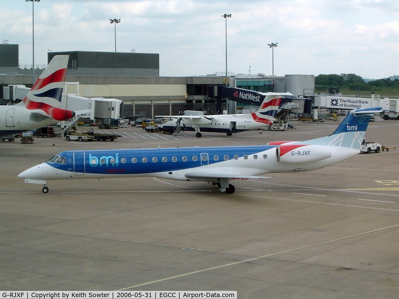 G-RJXF, 2000 Embraer EMB-145EP (ERJ-145EP) C/N 145280, Taken through tinted glass