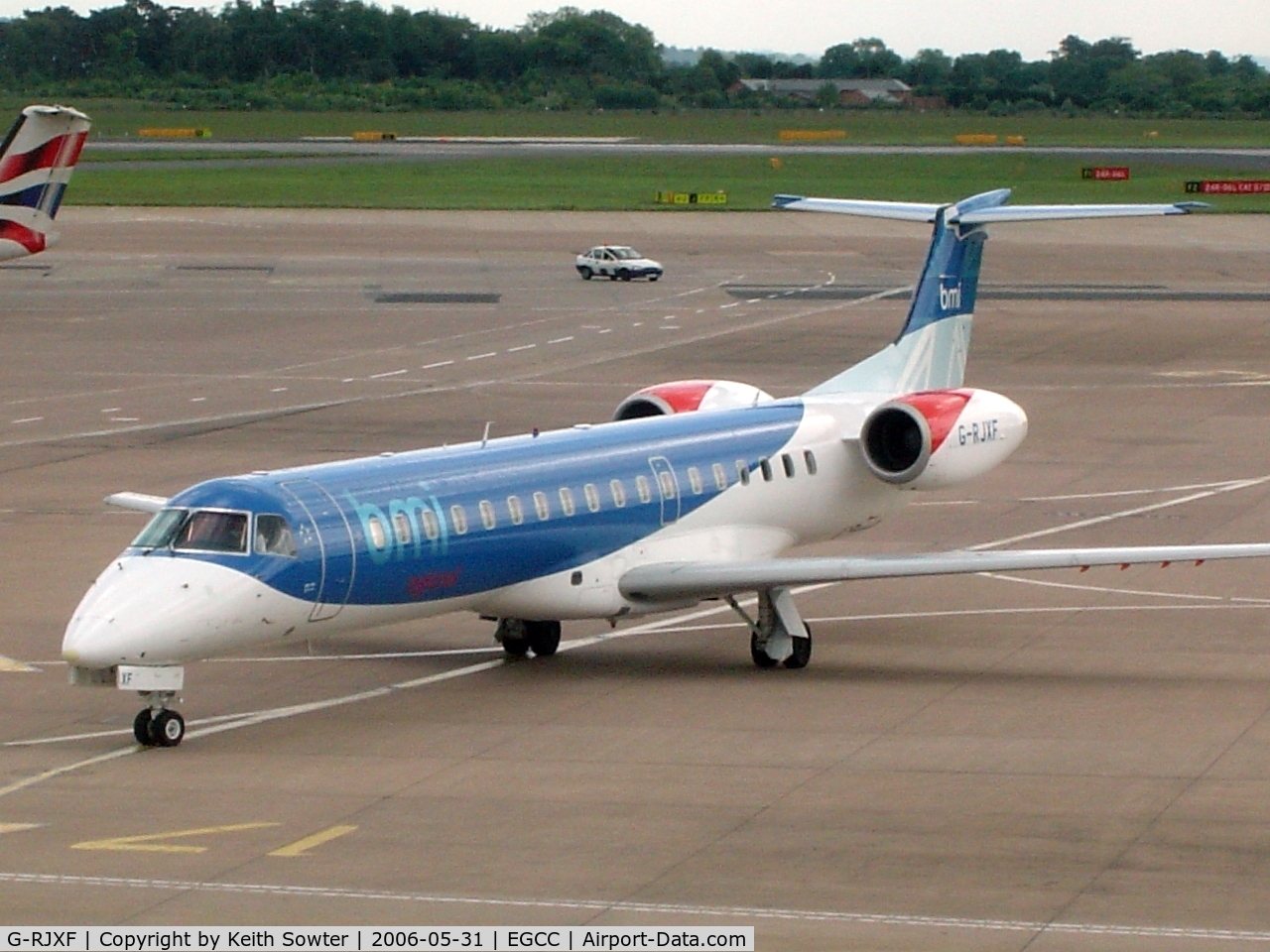 G-RJXF, 2000 Embraer EMB-145EP (ERJ-145EP) C/N 145280, Taken through tinted glass