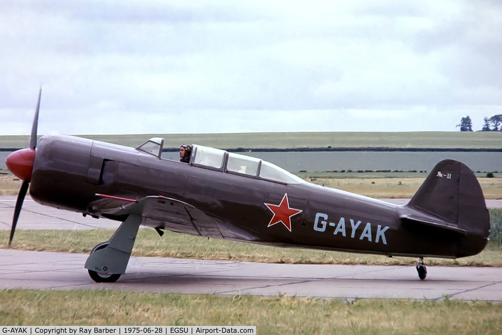G-AYAK, 1956 Let C-11 (Yak-11) C/N 172701, Yakovlev Yak-C11 [172701] Duxford~G 28/06/1975. From a slide.