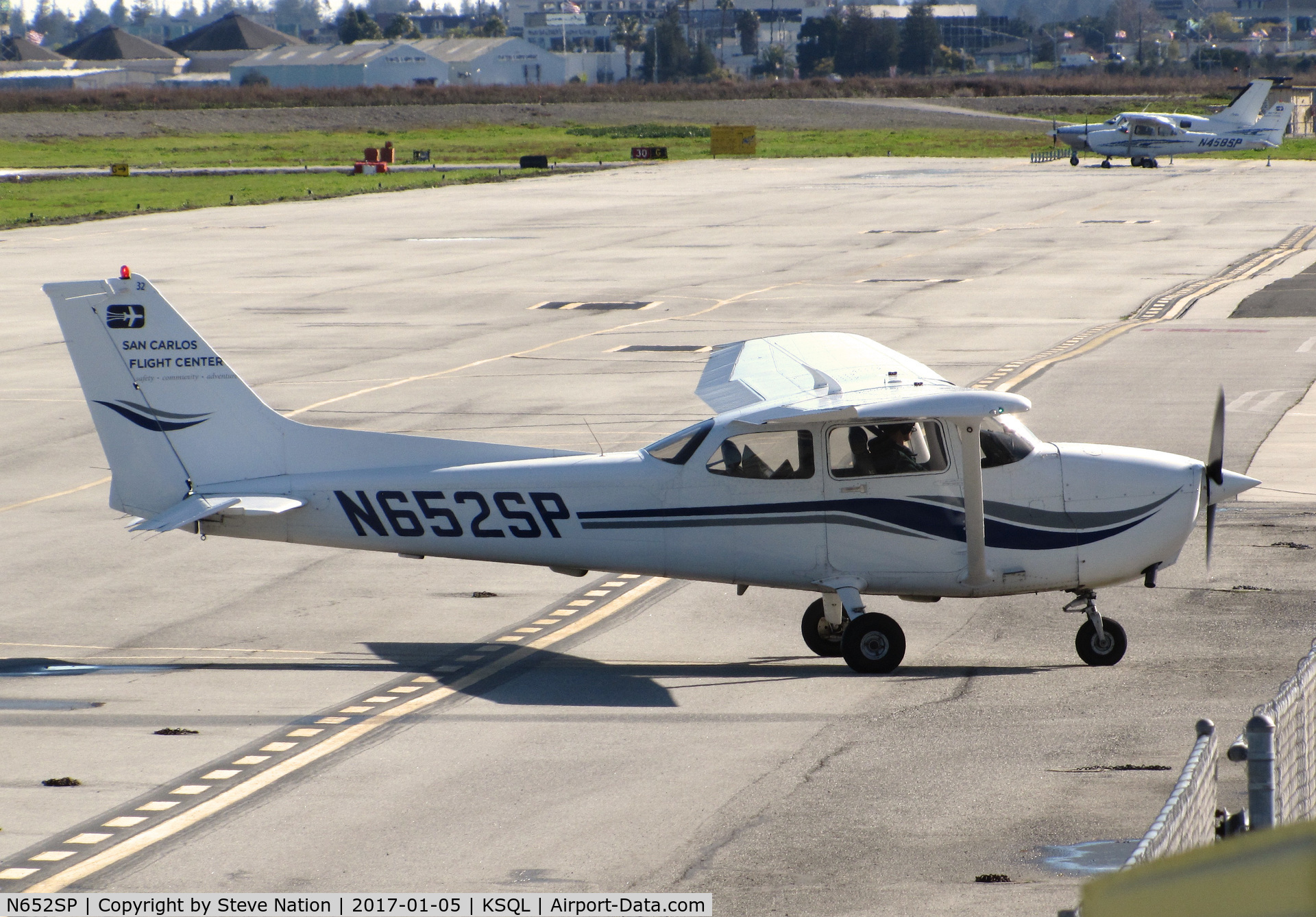 N652SP, 1998 Cessna 172S C/N 172S8058, San Carlos Flight Center 1998 Cessna 172S Skyhawk taxiing in @ KSQL home base