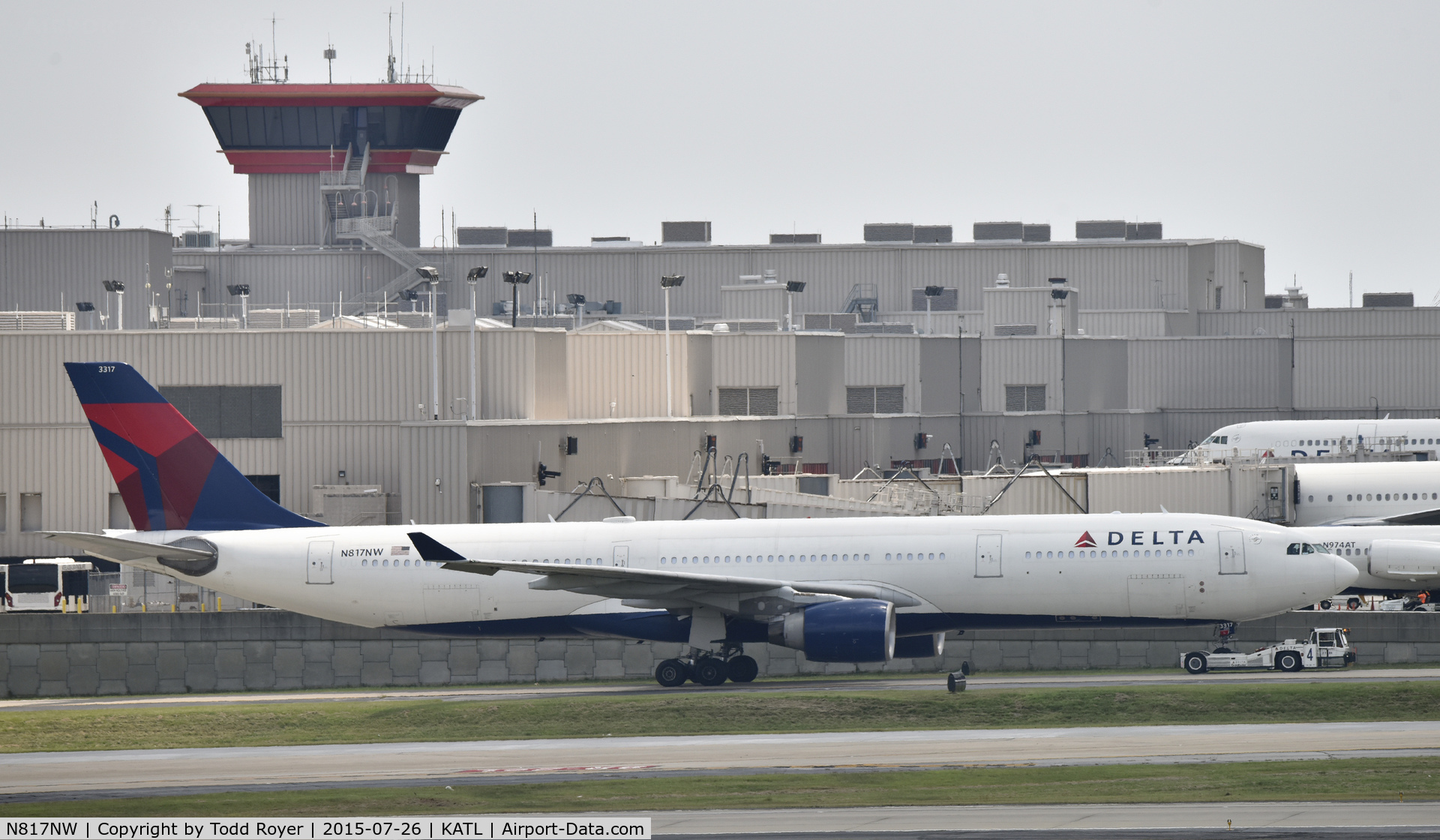 N817NW, 2007 Airbus A330-323 C/N 0843, Getting towed to a gate at Atlanta
