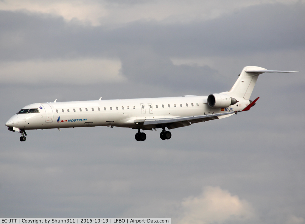 EC-JTT, 2006 Bombardier CRJ-900 (CL-600-2D24) C/N 15074, Landing rwy 32R in white c/s with titles