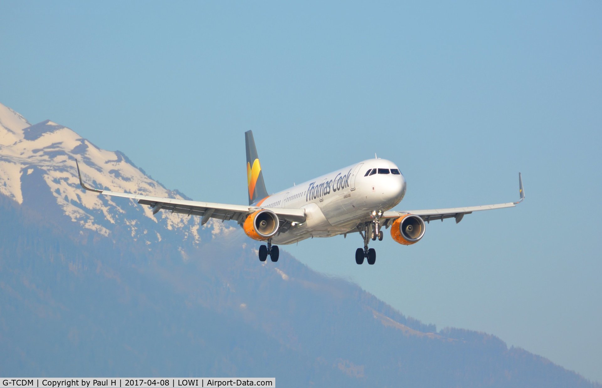G-TCDM, 2016 Airbus A321-211 C/N 7003, Landing at LOWI with the austrian alps in the background