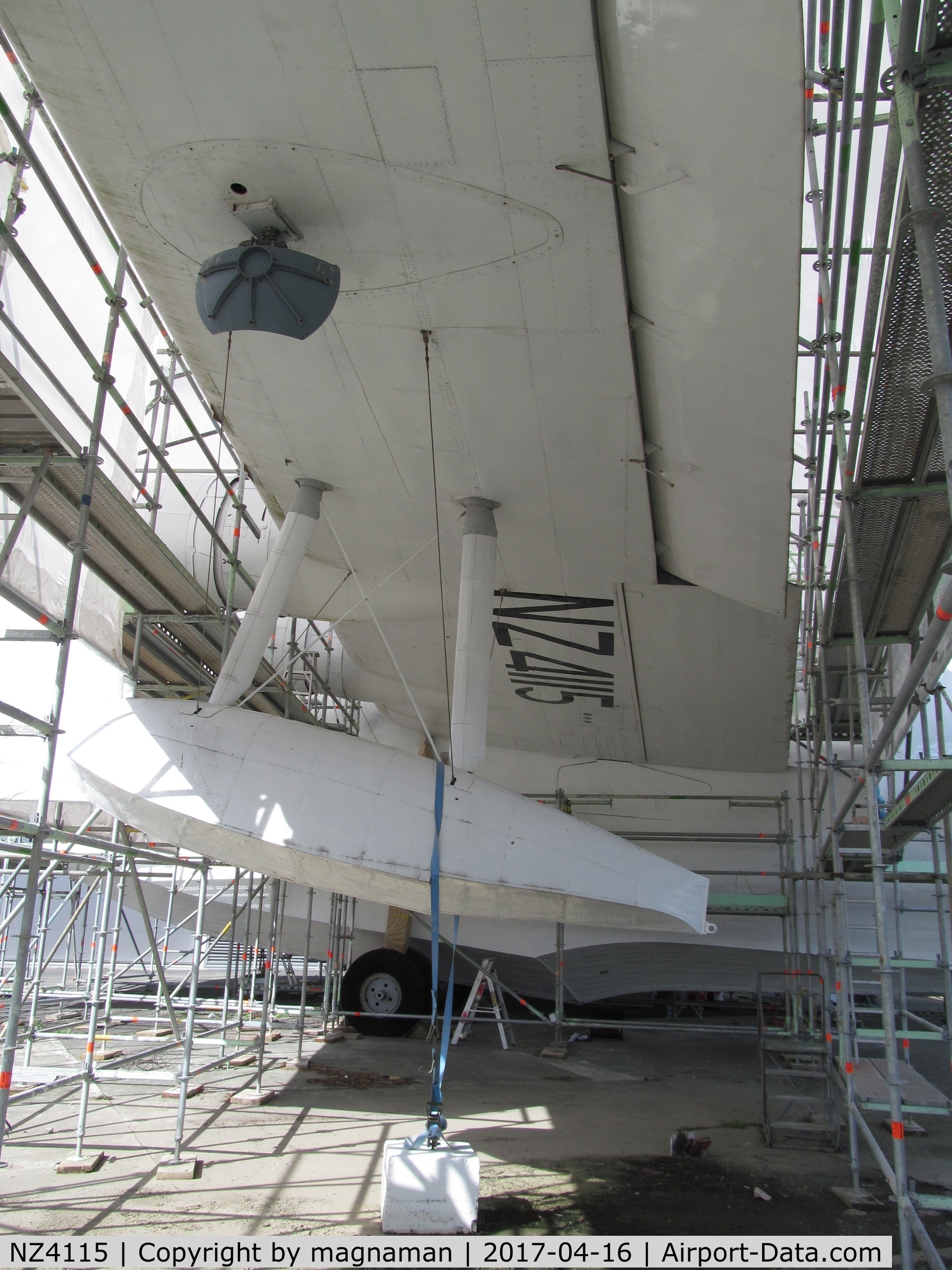 NZ4115, Short S.25 Sunderland V C/N SH.1552, now under scaffold and wrap protection outside MOTAT main hangar
