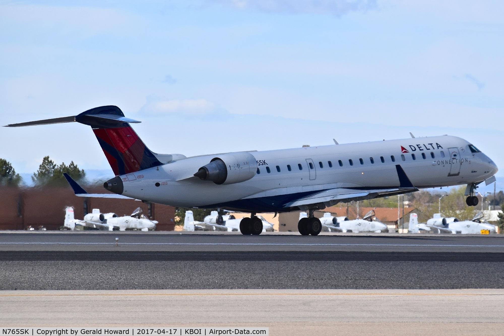 N765SK, 2005 Bombardier CRJ-702 (CL-600-2C10) Regional Jet C/N 10231, Take off roll on RWY 28R.