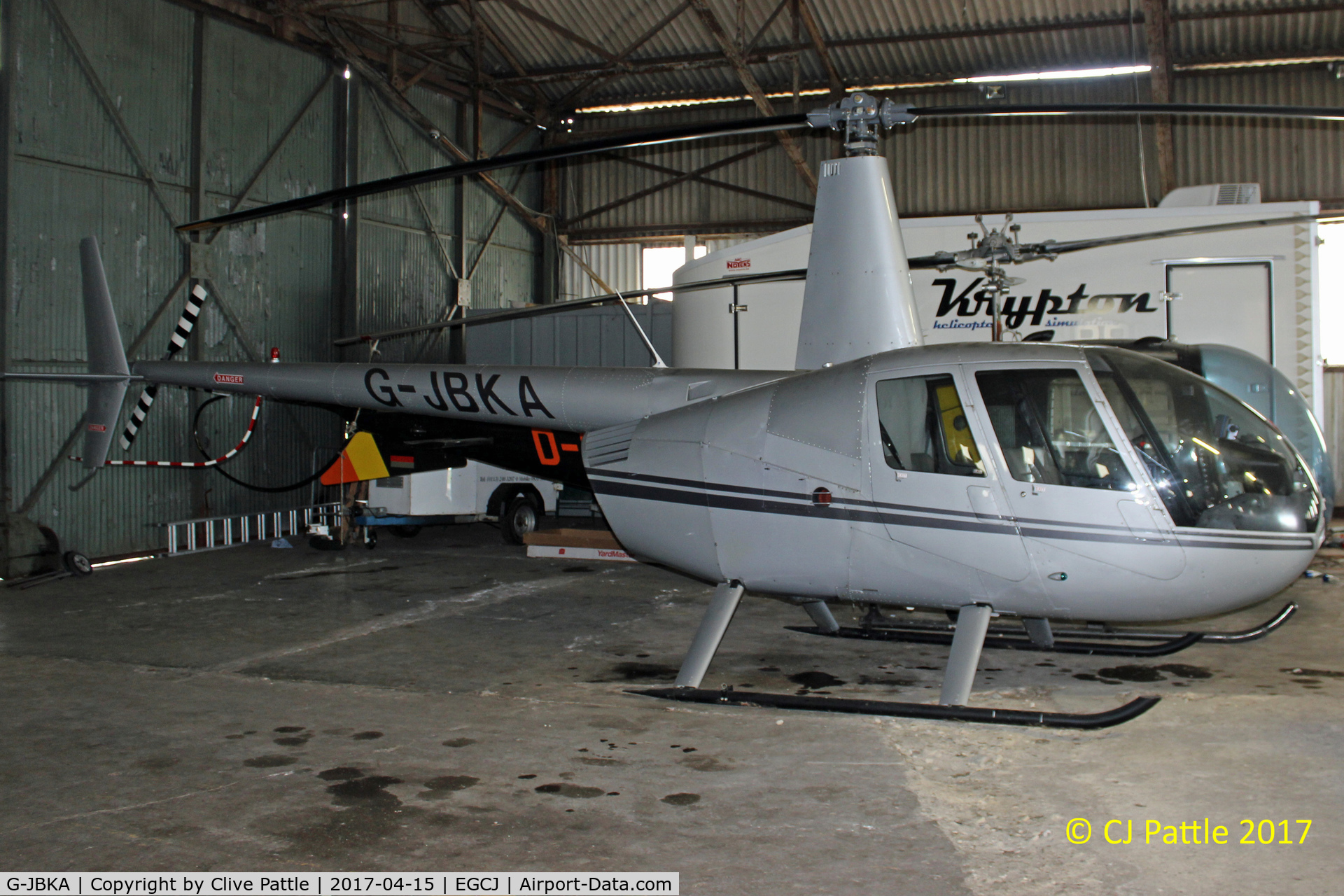 G-JBKA, 2002 Robinson R44 Raven C/N 1175, Hangared at EGCJ