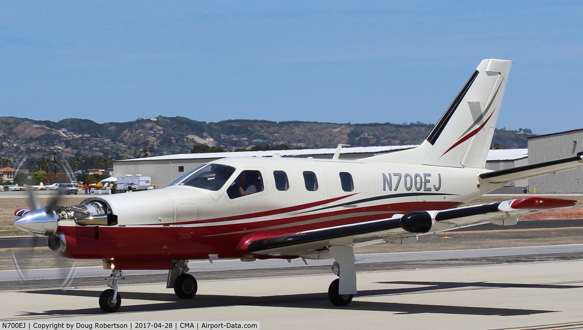 N700EJ, 2004 Socata TBM-700 C/N 291, 2004 Socata TBM-700, one P&W(C)PT6A-64 turboprop, 1,580 sHp flat rated to 700 sHp, taxi with cowl partly off. See far earlier photo for a cowl on shot.