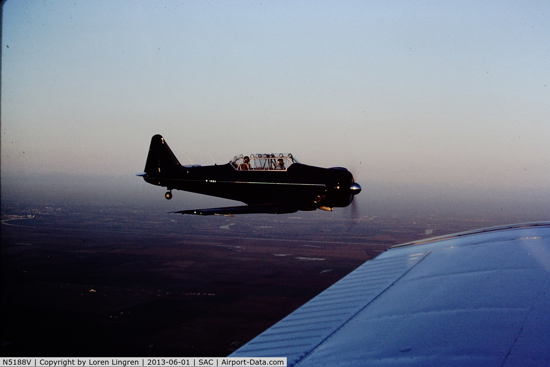 N5188V, North American T-6G Texan C/N 168-302, The original photo is a slide taken around 1976.  I scanned it, though the quality is not too good.