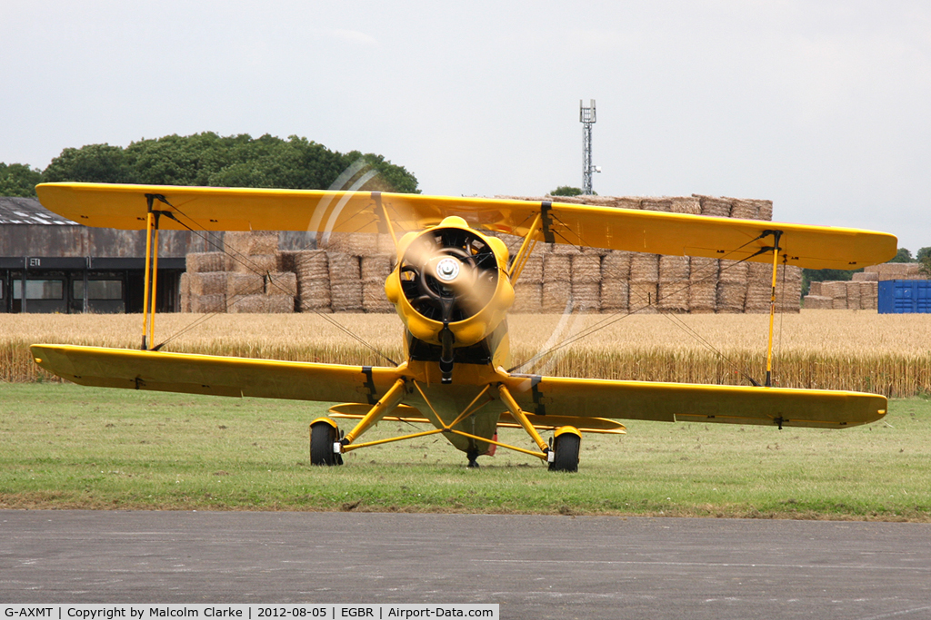 G-AXMT, 1938 Bucker Bu-133C Jungmeister C/N 46, Doflug Bu-133C Jungmeister at Breighton Airfield's Summer Madness Fly-In. August 5th 2012.