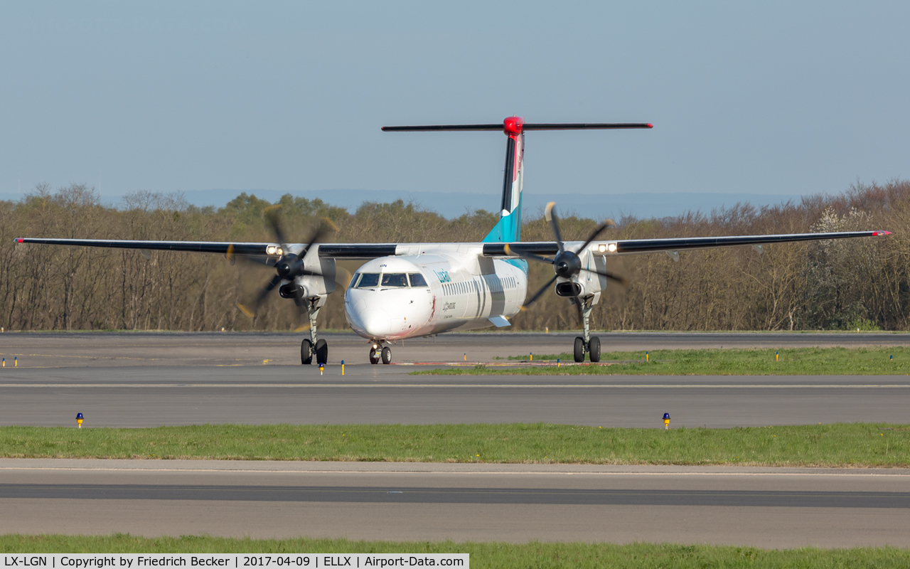 LX-LGN, 2012 De Havilland Canada DHC-8-402Q Dash 8 C/N 4426, taxying to the apron