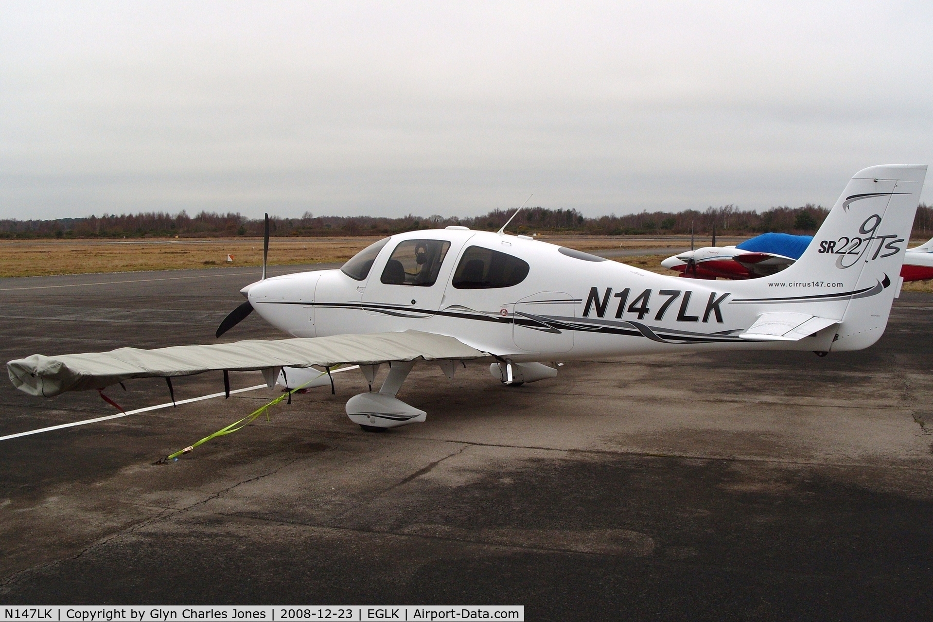 N147LK, 2005 Cirrus SR22 GTS C/N 1687, Previously N754CD. With wing covers. Owned by Free Flight Aviation Inc Trustee.