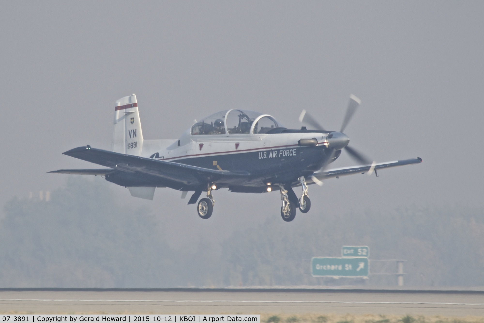 07-3891, 2007 Raytheon T-6A Texan II C/N PT-446, Taking off from RWY 10R in IFR smoke conditions. 71st Flying Training Wing, 8th Flying Training Squadron  “8 Ballers”, Vance AFB, OK.