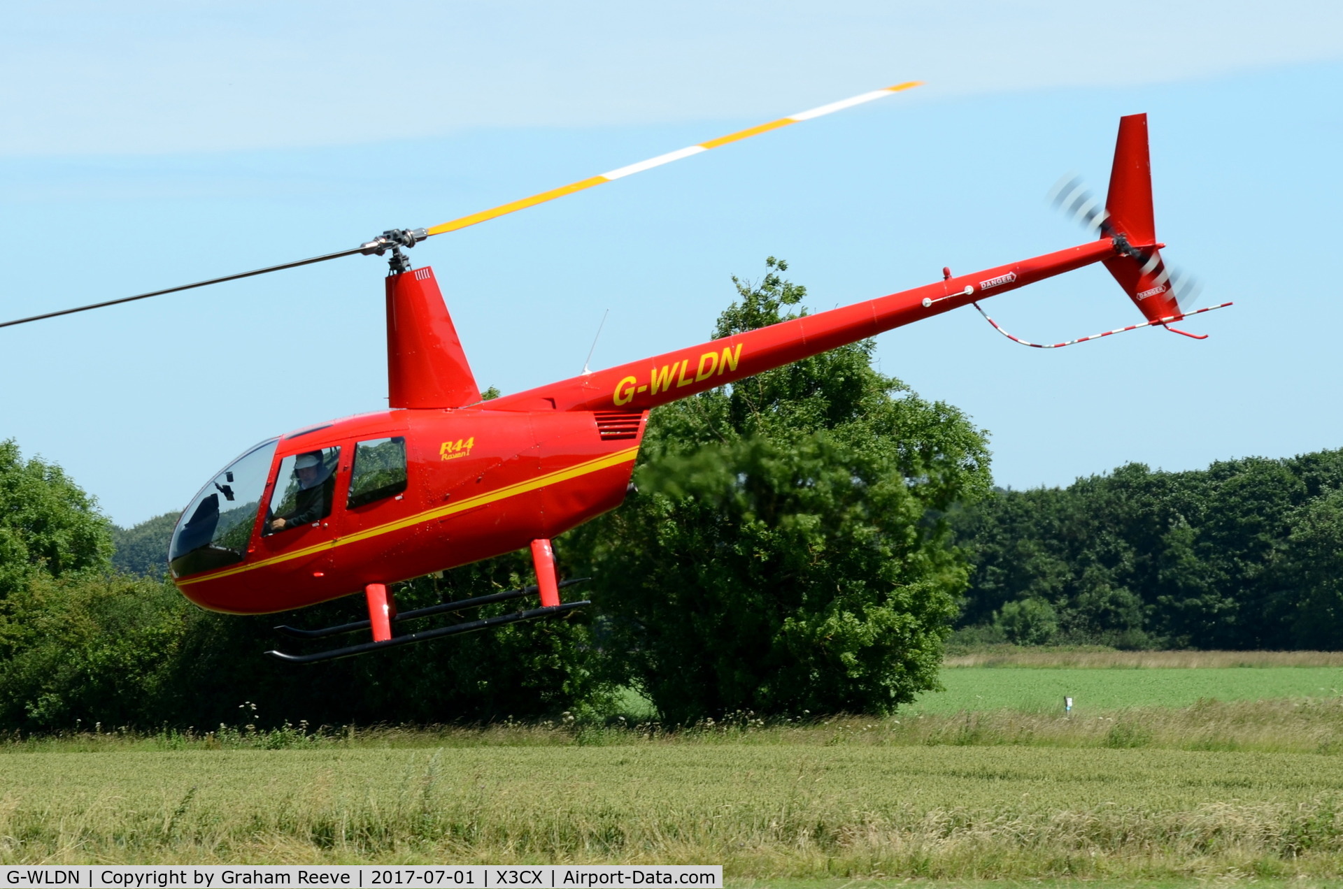 G-WLDN, 2005 Robinson R44 Raven 1 C/N 1507, Departing from Northrepps.