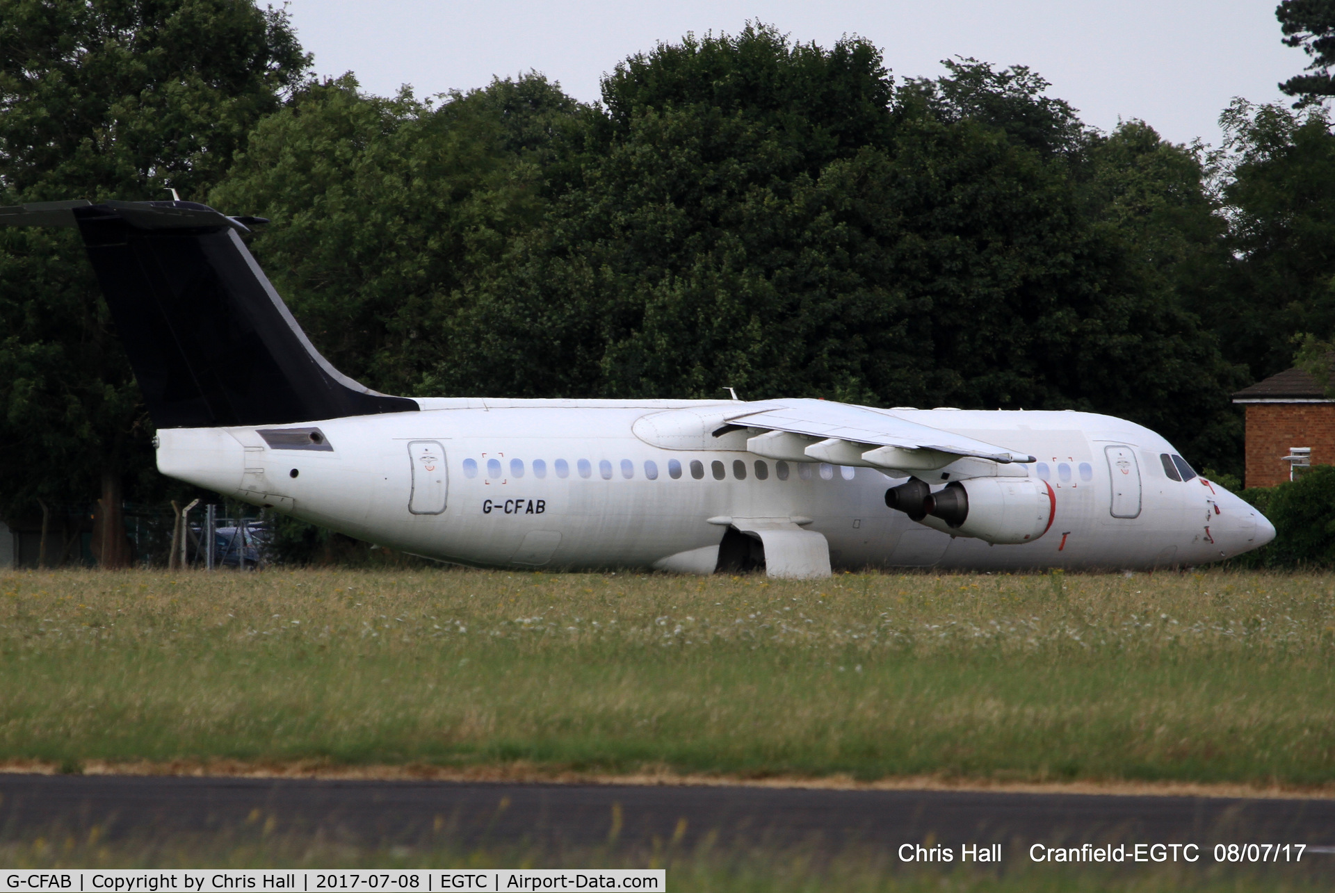 G-CFAB, 2000 British Aerospace Avro 146-RJ100 C/N E3377, stored at Cranfield
