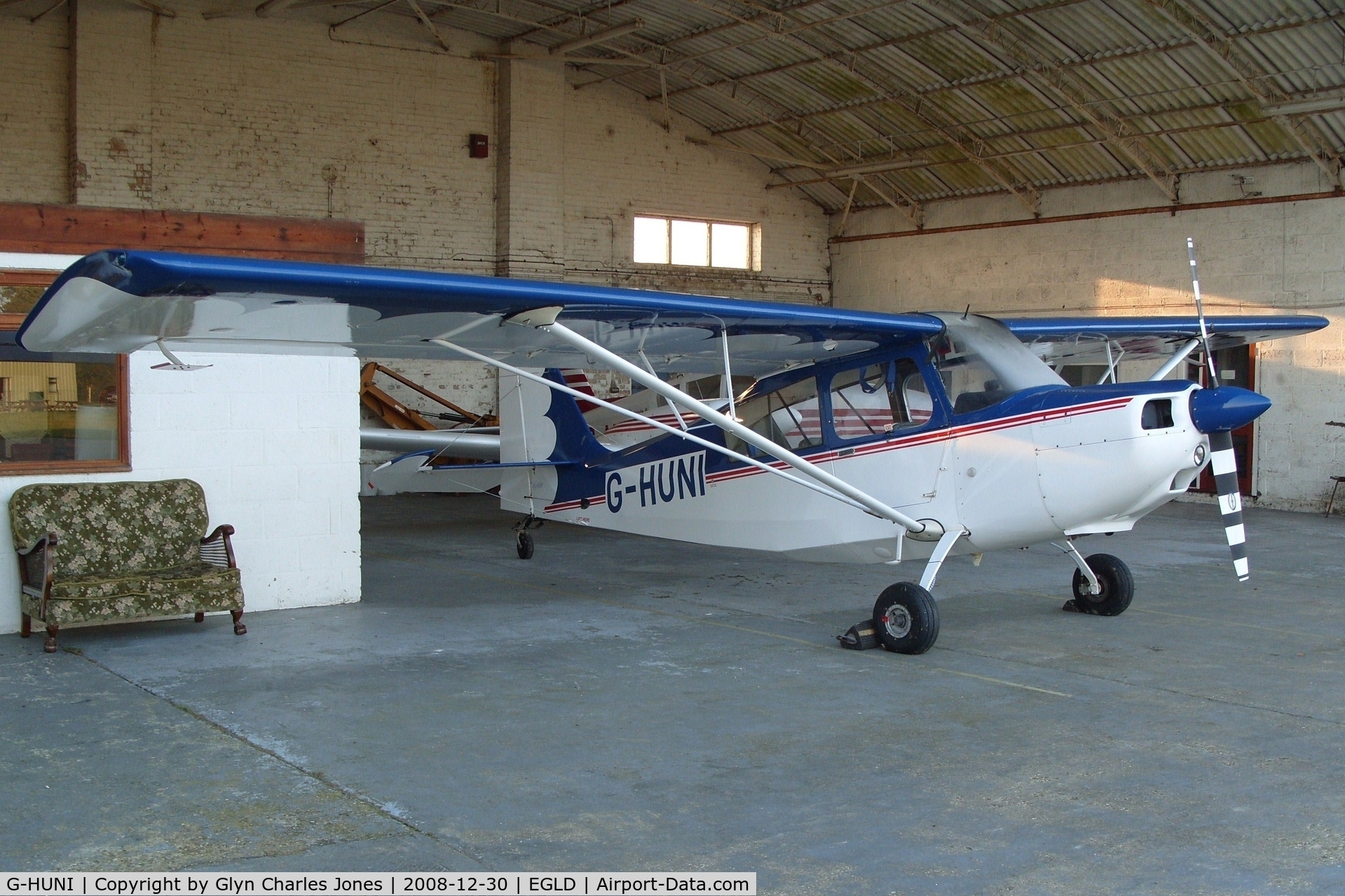G-HUNI, 1973 Bellanca 7GCBC Citabria C/N 541-73, Residing in The Pilot Centre hangar it shares with Piper PA-30-160 Twin Comanche B G-AZAB. Previously OO-IME and D-EIME. With thanks to The Pilot Centre who are the Citabria's owners.