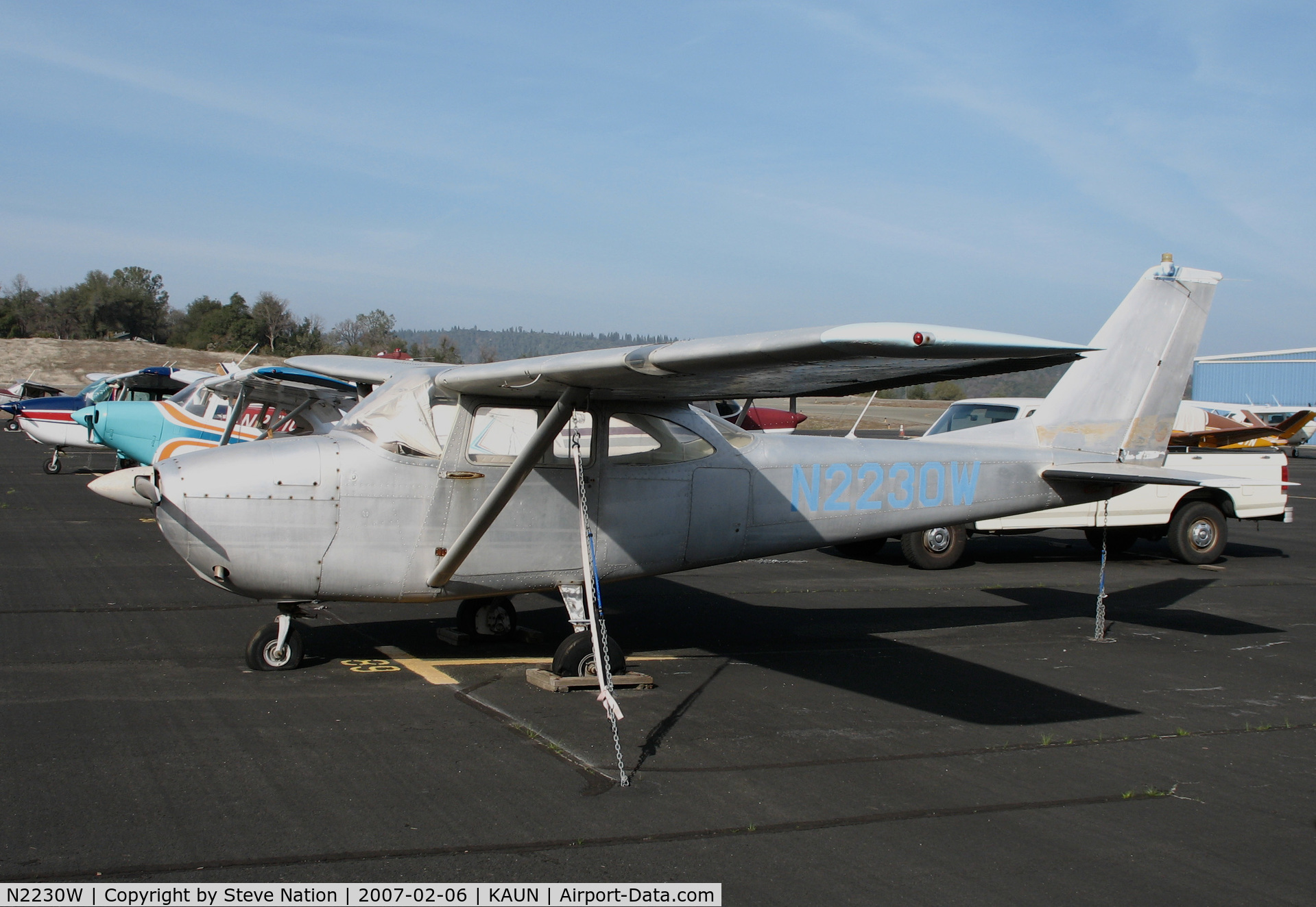 N2230W, 1963 Cessna 172D C/N 17250077, Locally-based 1963 Cessna 172D Skyhawk still in bare aluminum finish @ Auburn Municipal Airport, CA