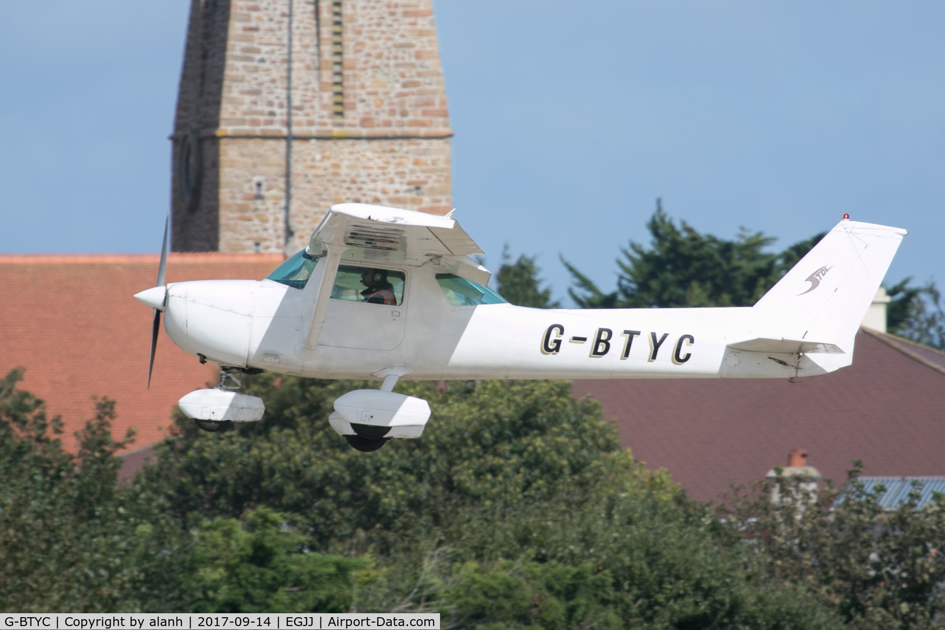 G-BTYC, 1975 Cessna 150L C/N 150-75767, Short finals for 26 in Jersey