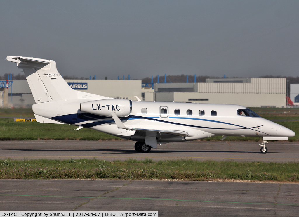 LX-TAC, 2015 Embraer EMB-505 Phenom 300 C/N 50500286, Taxiing to the General Aviation area...