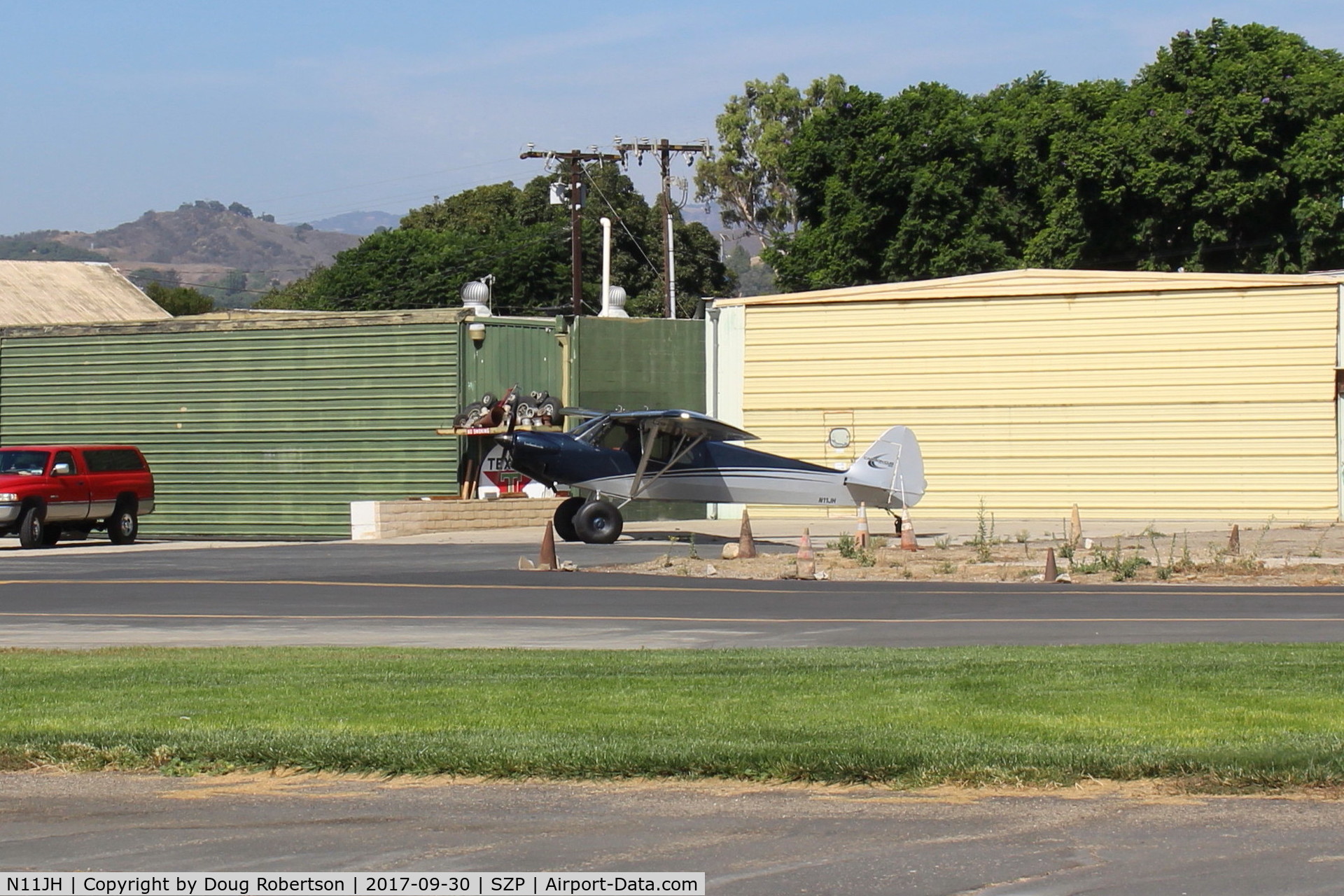 N11JH, 2016 Cub Crafters CC11-160 Carbon Cub SS C/N CC11-00415, 2016 CubCrafters CC11-160 CARBON CUB S, Titan OX-340CC 160 Hp, engine warmup on the aircraft's yellow hangar ramp.