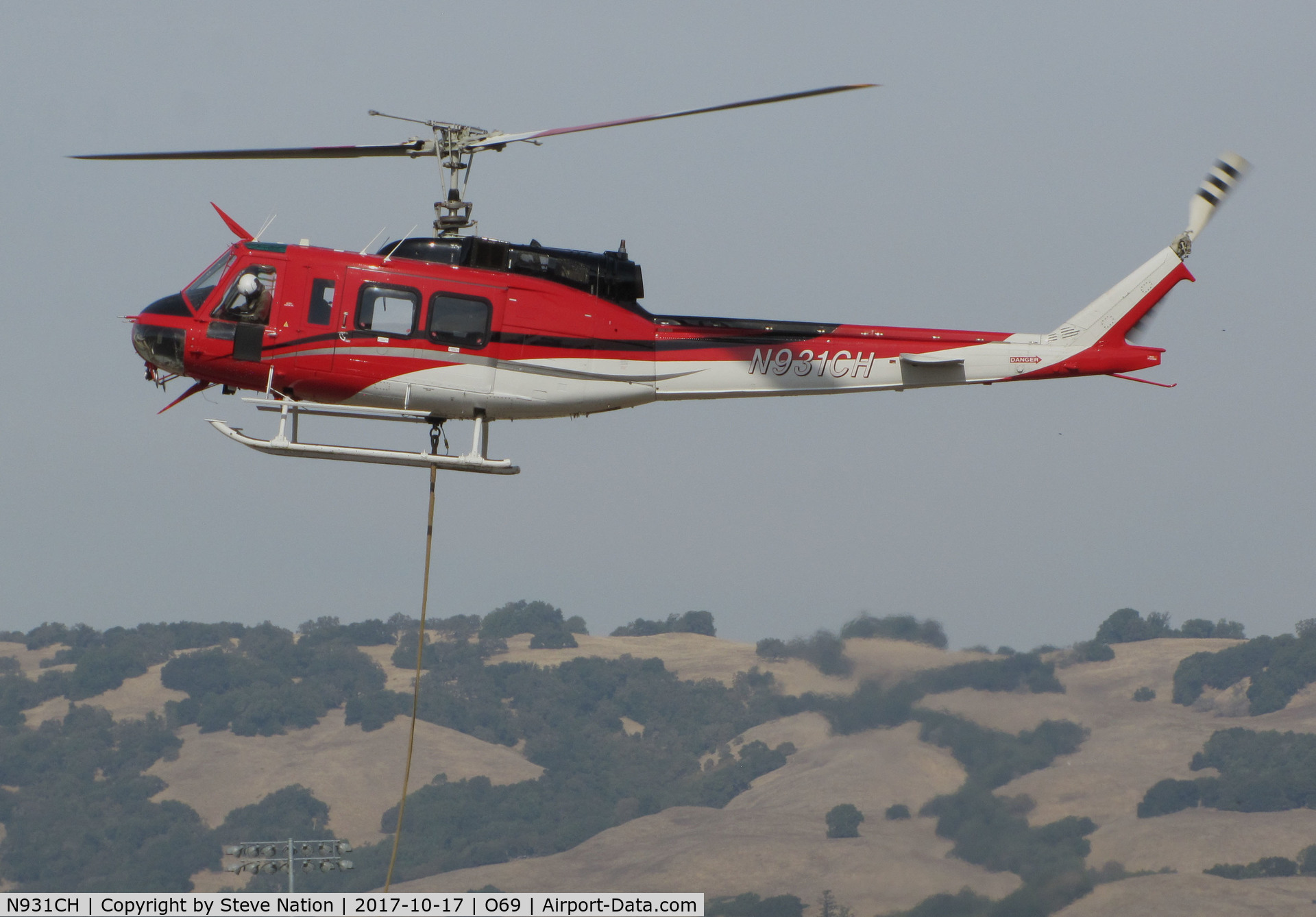 N931CH, 1972 Bell 205A-1 C/N 30110, Heligroup Fire LLC (Missoula, MT) 1972 Bell 205A-1 ready to land at Petaluma Municipal Airport, CA temporary home base from making water drops on the devastating October 2017 Northern California wildfires