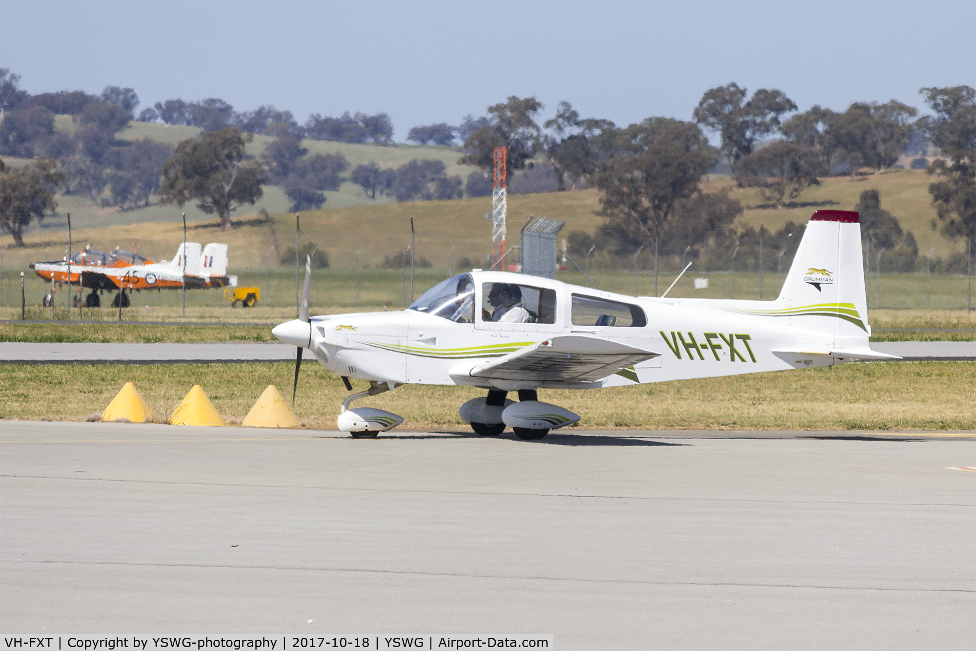 VH-FXT, 1975 American Aircraft Corp AA-5A C/N AA5A-0016, American AA-5A Traveler (VH-FXT) taxiing at Wagga Wagga Airport.