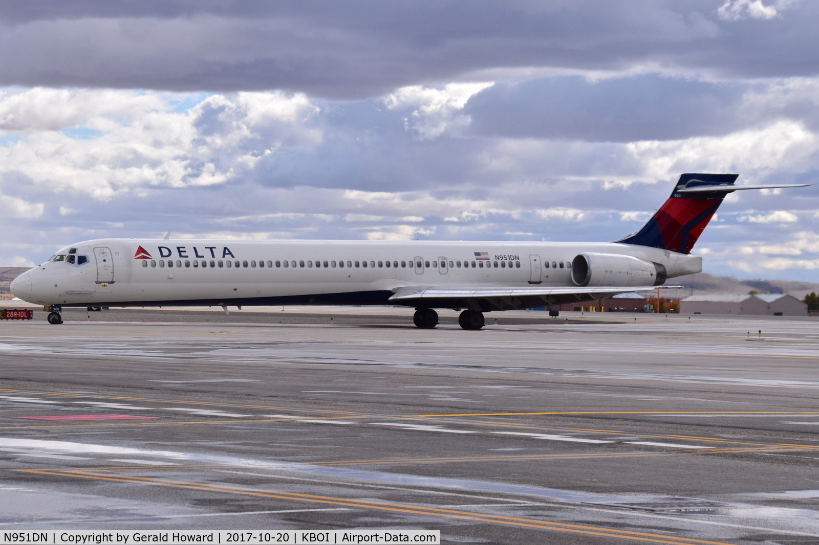 N951DN, 1997 McDonnell Douglas MD-90-30 C/N 53361, Taxiing off RWY 28L.
