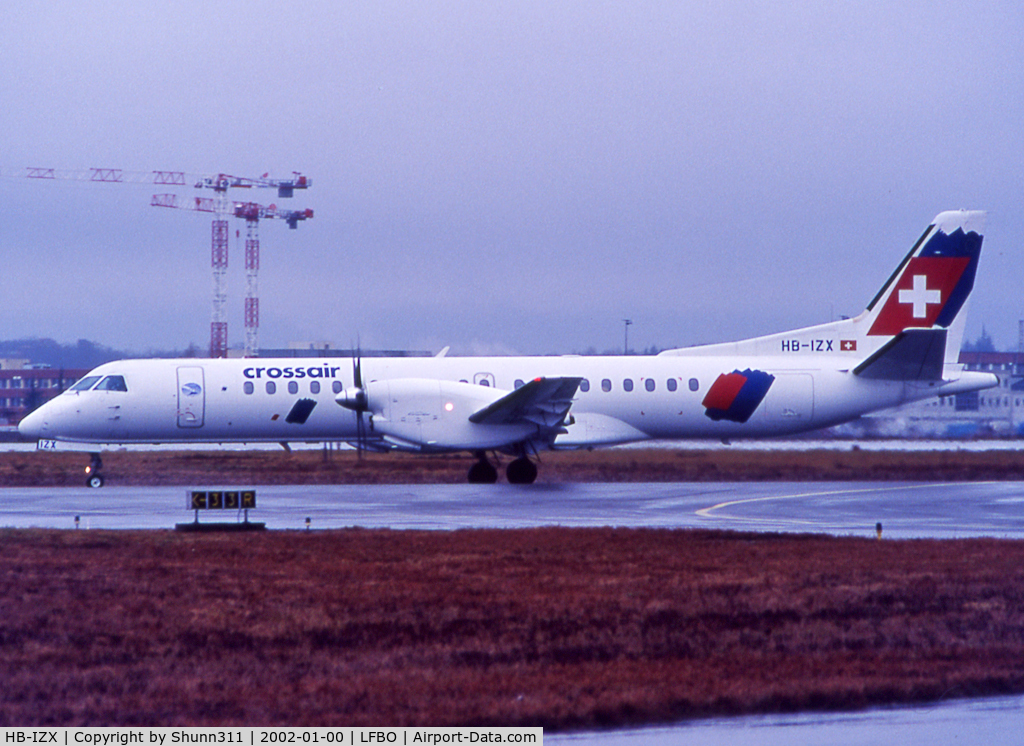 HB-IZX, 1996 Saab 2000 C/N 2000-041, Taxiing holding point rwy 32R for departure...