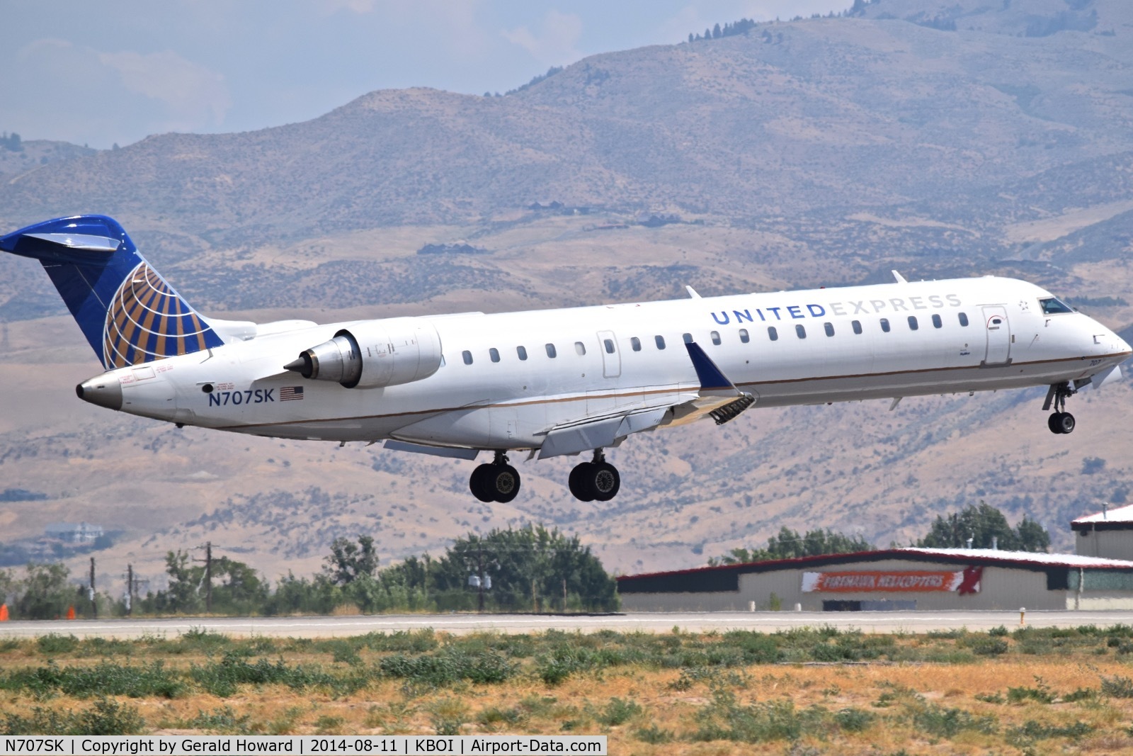 N707SK, 1999 Bombardier CRJ-701ER (CL-600-2C10) Regional Jet C/N 10003, Landing RWY 10R.