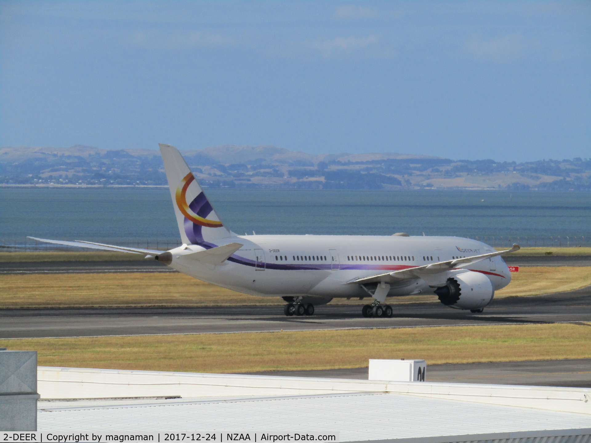 2-DEER, 2013 Boeing 787-8 BBJ Dreamliner Dreamliner C/N 35309, on way to remote stand out of view