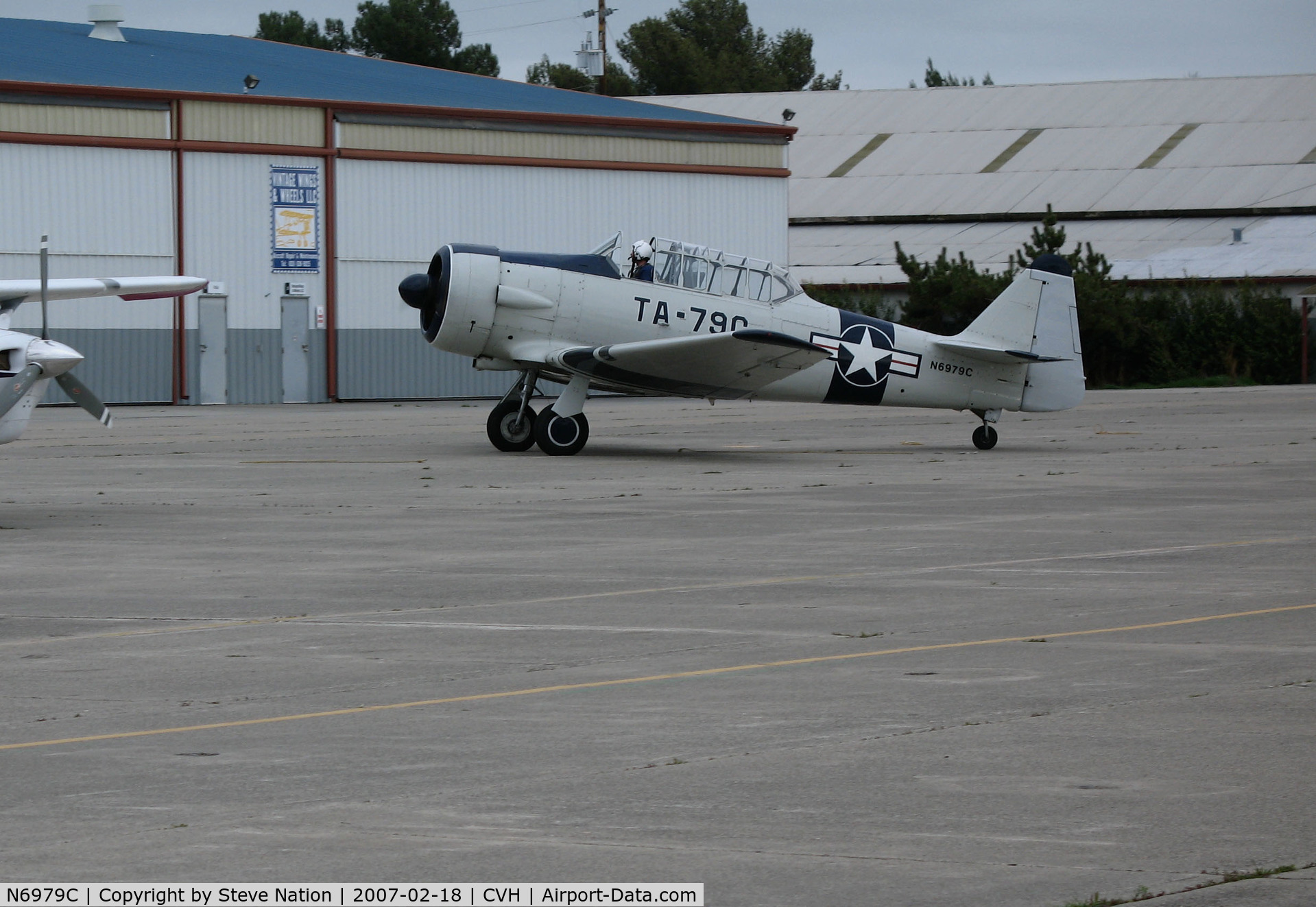 N6979C, North American AT-6D Texan C/N 42-85408, North American AT-6D in USAF c/s with TA-79C code taxiing for fuel @ Hollister Municipal Airport, CA