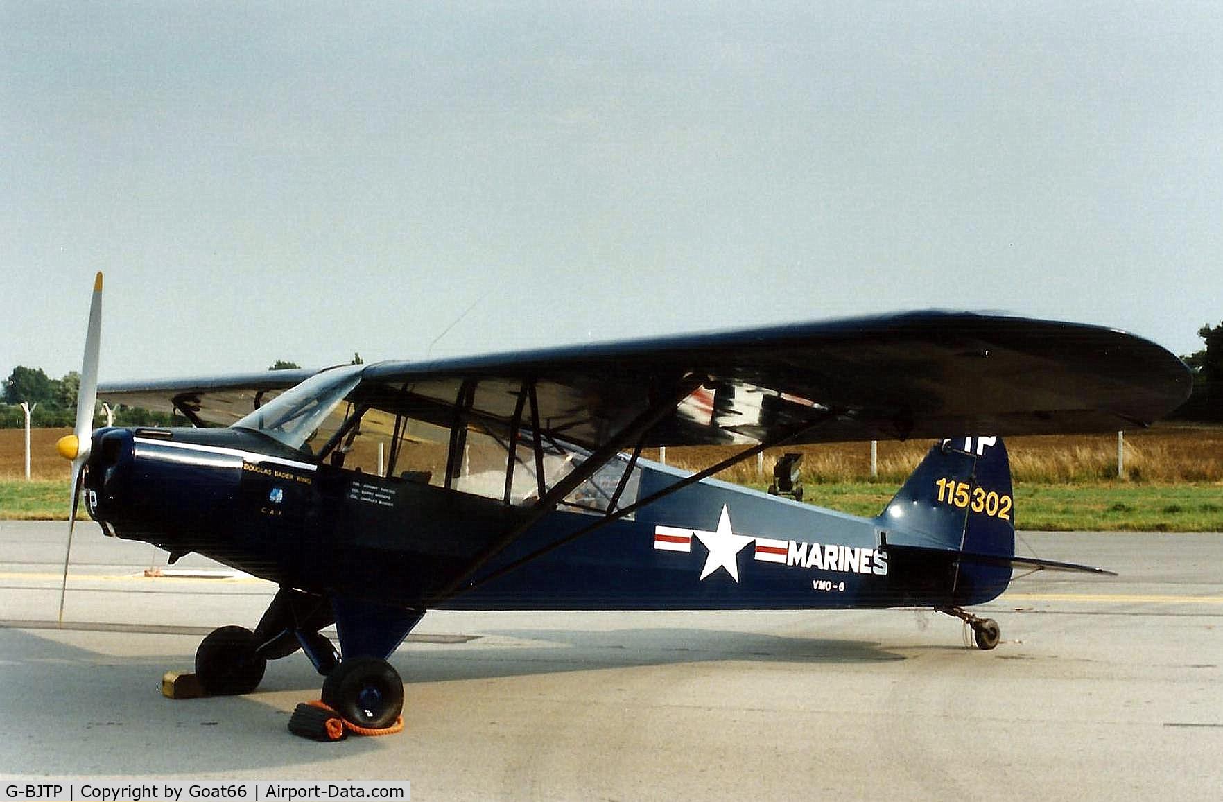 G-BJTP, 1951 Piper L-18C Super Cub (PA-18-95) C/N 18-999, Well known on the UK display circuit, and seen here in cosmetic US Marine Corps colours at IAT 89, RAF Fairford, July 1989