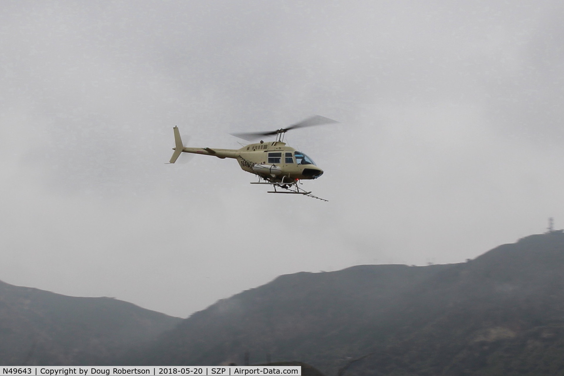 N49643, 1975 Bell 206B JetRanger C/N 1813, 1975 Bell 206B JetRanger, one Allison 250-C20 Turboshaft, 420 SHp for 5 min. 370 SHp continuous, Extra fuel mod by STC, returning from aerial applicator spray job to Aspen at KOXR over Santa Clara River route.