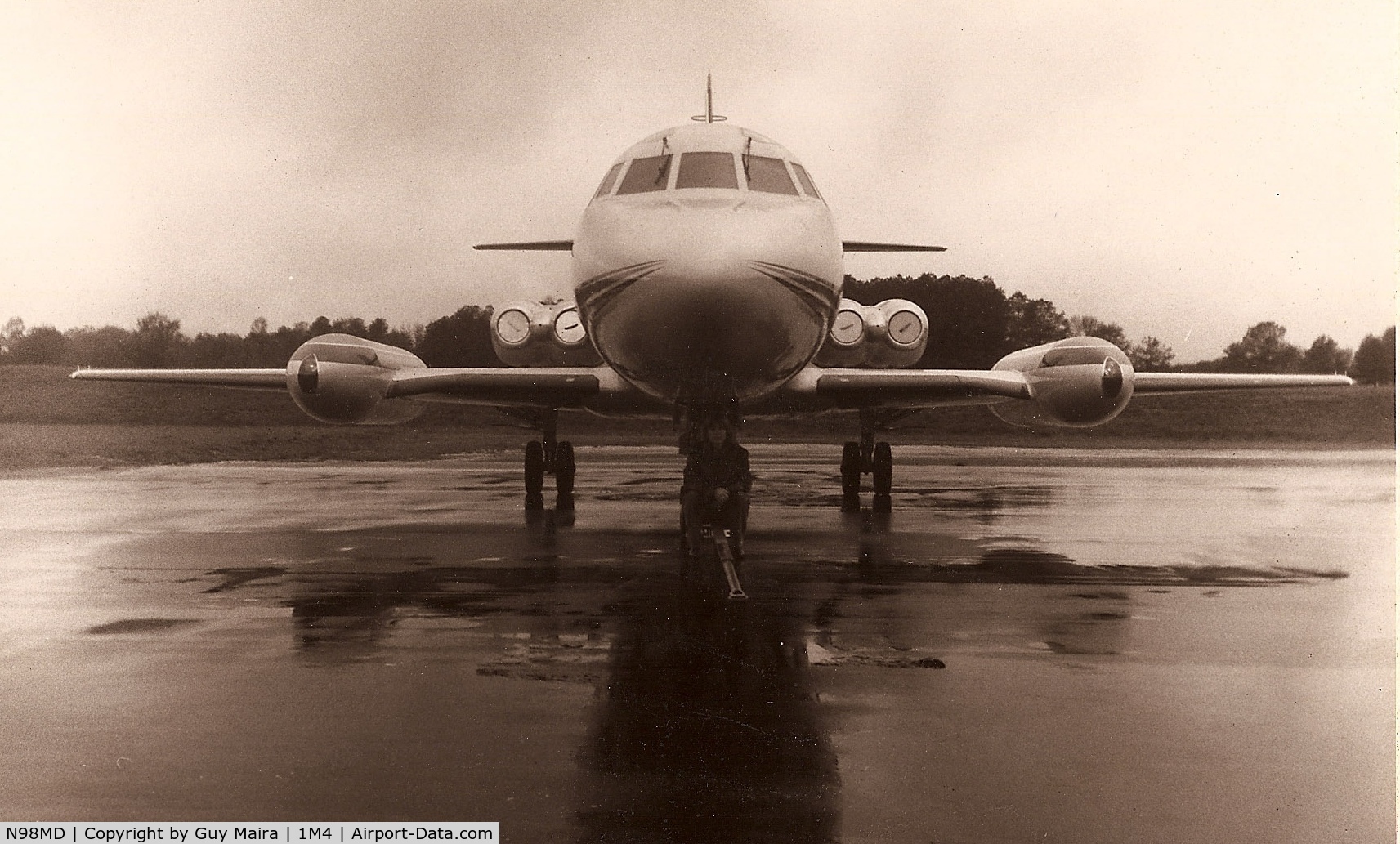 N98MD, 1964 Lockheed L-1329 Jetstar 6 C/N 5048, Great old -8 sitting at Haleyville, AL after a rainy trip.