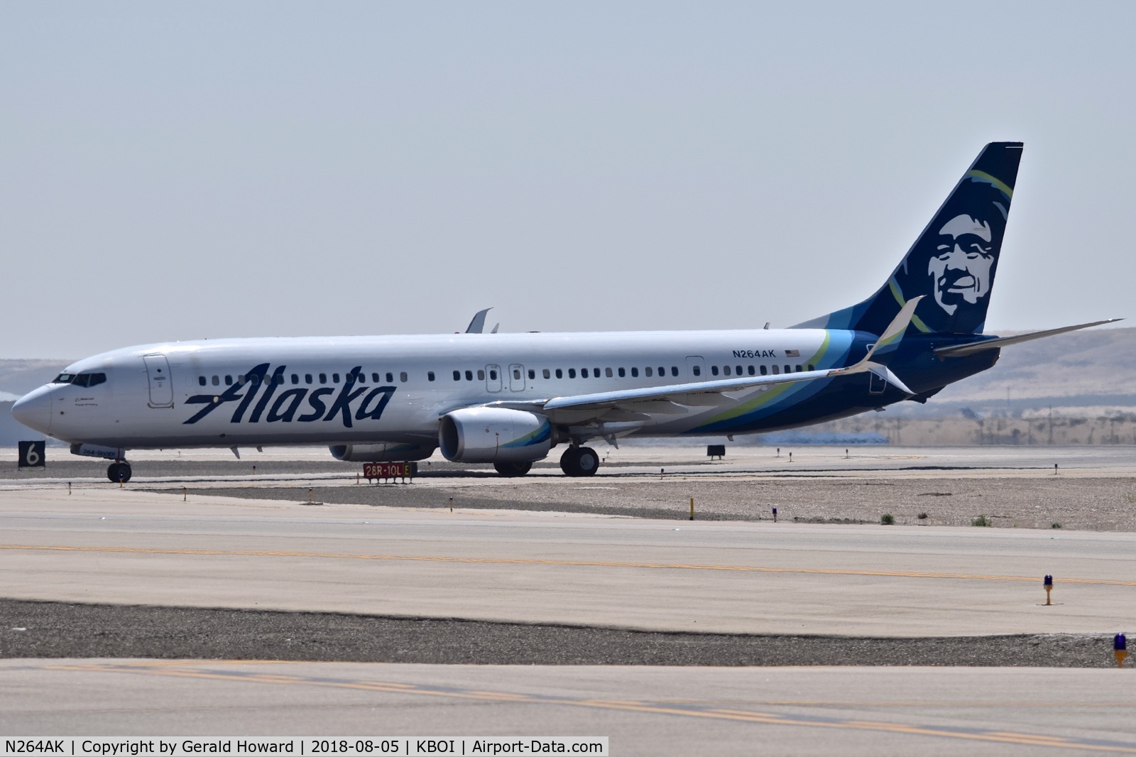 N264AK, 2016 Boeing 737-990/ER C/N 36360, Turning off RWY 28R.