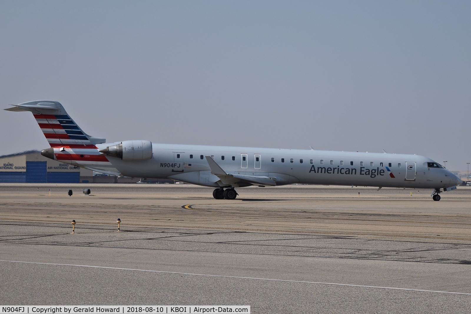 N904FJ, 2003 Bombardier CRJ-900ER (CL-600-2D24) C/N 15004, Taxiing onto the Terminal ramp.