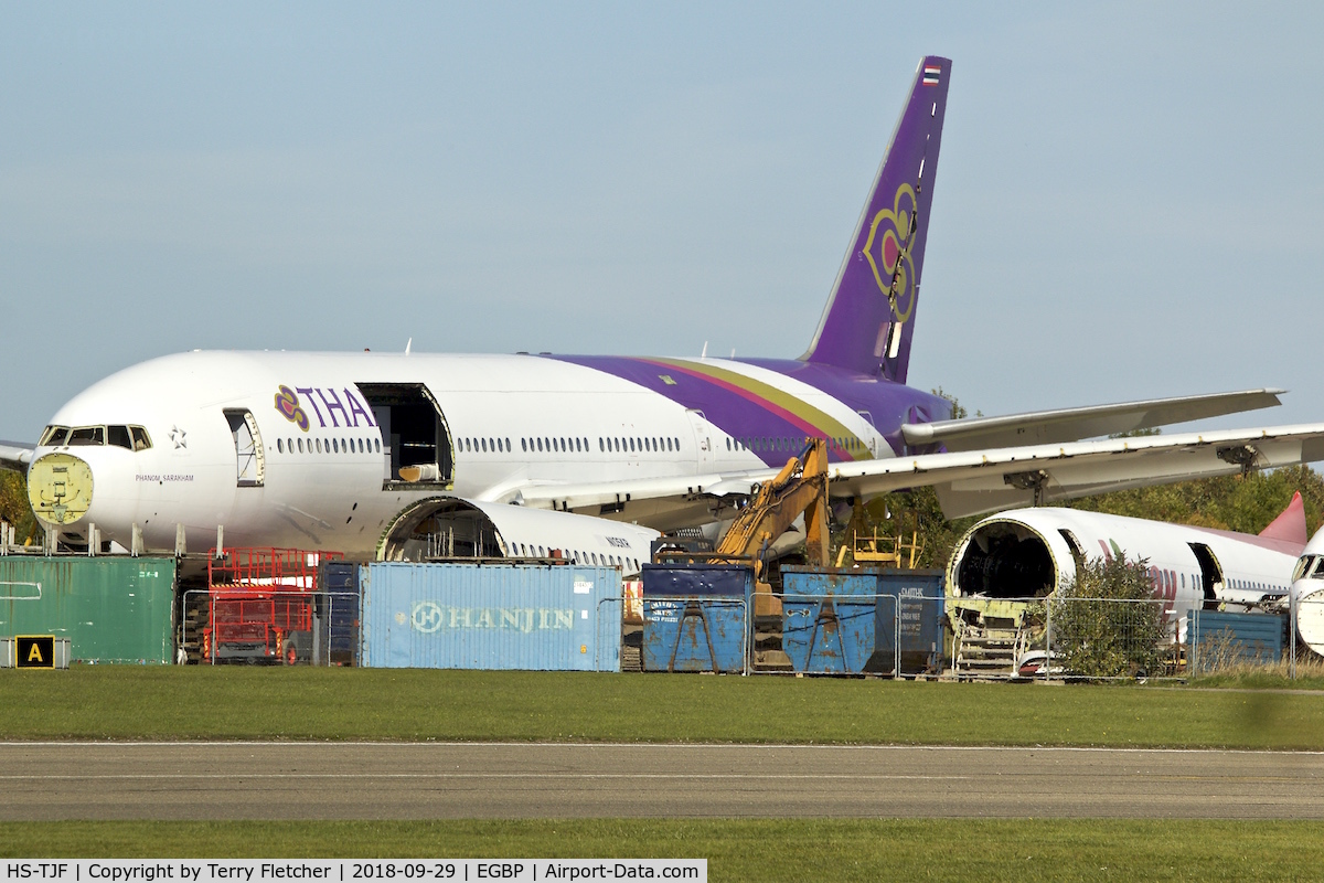 HS-TJF, 1997 Boeing 777-2D7 C/N 27731, With Air Salvage International for parting out at Cotswold Airport  Kemble , UK