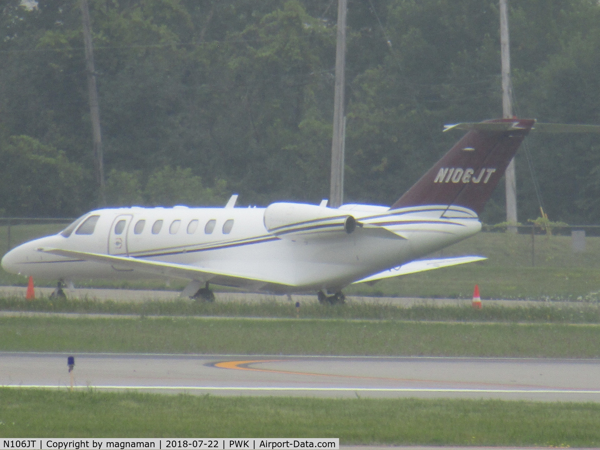 N106JT, 2006 Cessna 525B CitationJet CJ3 C/N 525B0106, rainy grainy shot