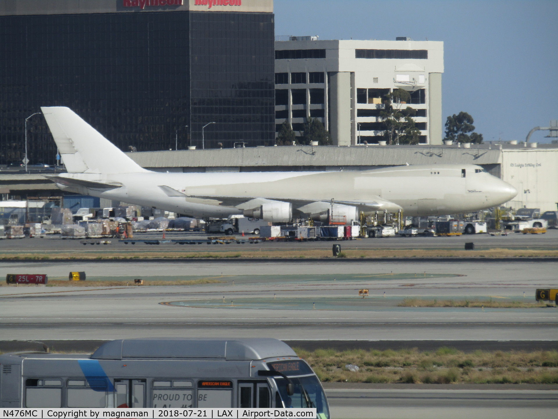 N476MC, 1999 Boeing 747-47UF C/N 29256, simple paint job! - on stand at LAX