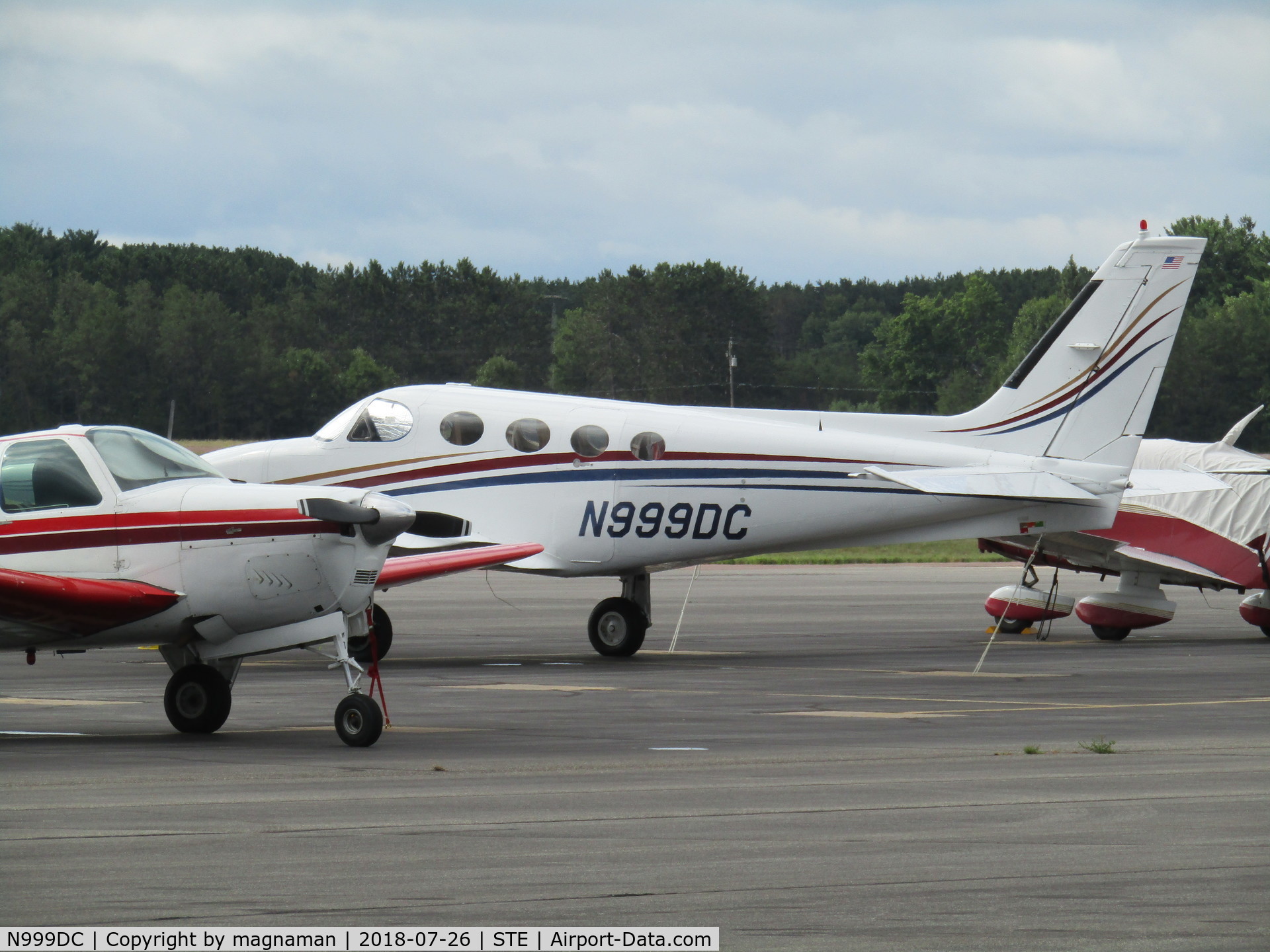 N999DC, 1976 Cessna 340A C/N 340A0035, on grey apron at STE