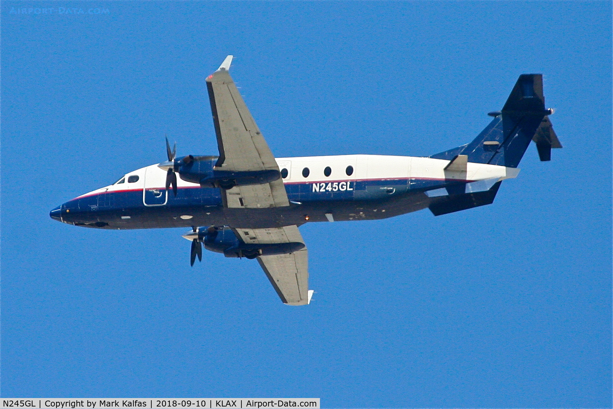 N245GL, 1996 Beech 1900D C/N UE-245, Departing 25R LAX. N245GL was withdrawn from service 2018-03-10.