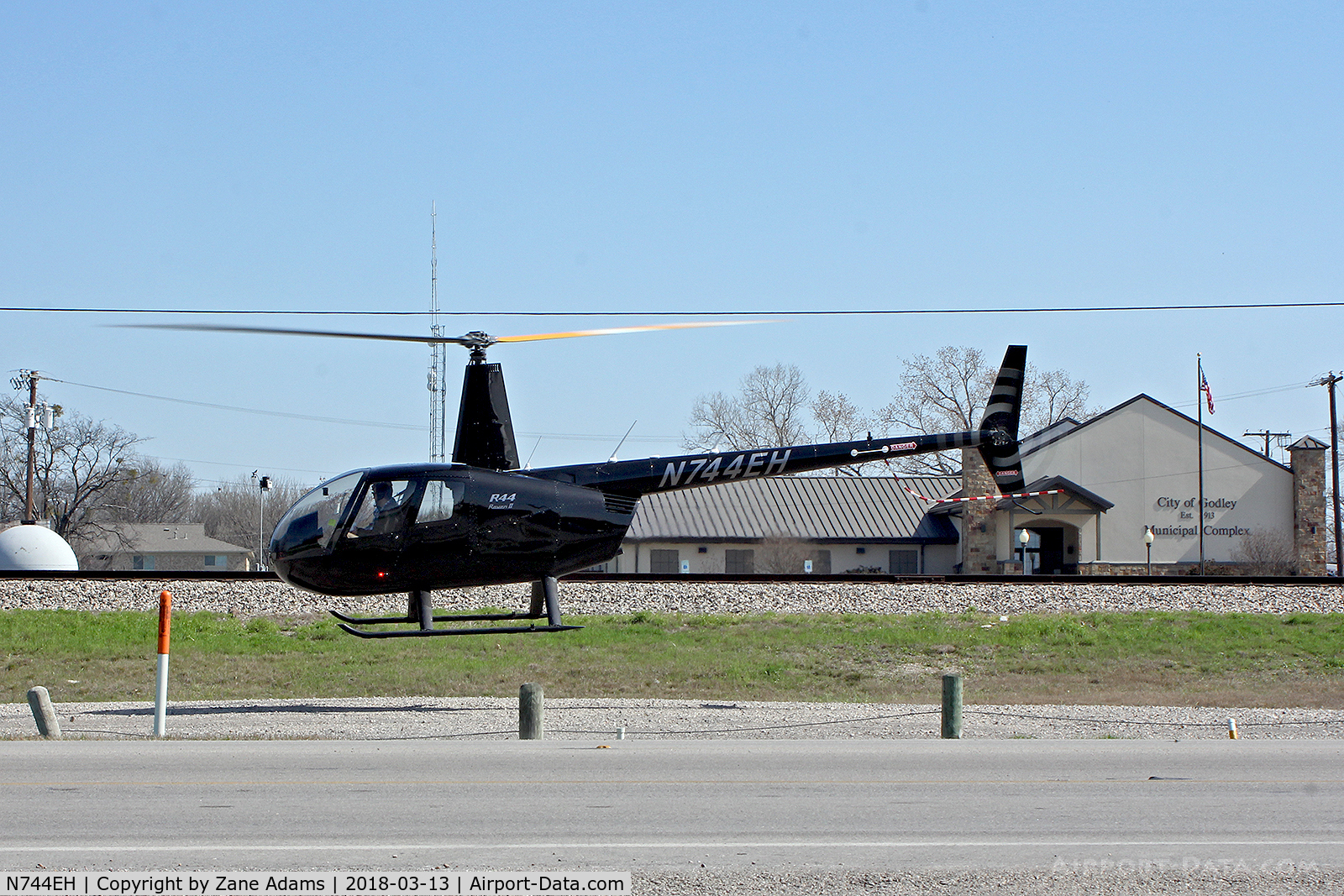 N744EH, 2015 Robinson R44 Raven II C/N 13883, Departing the roadside at Del Norte Tacos in Godley, Texas