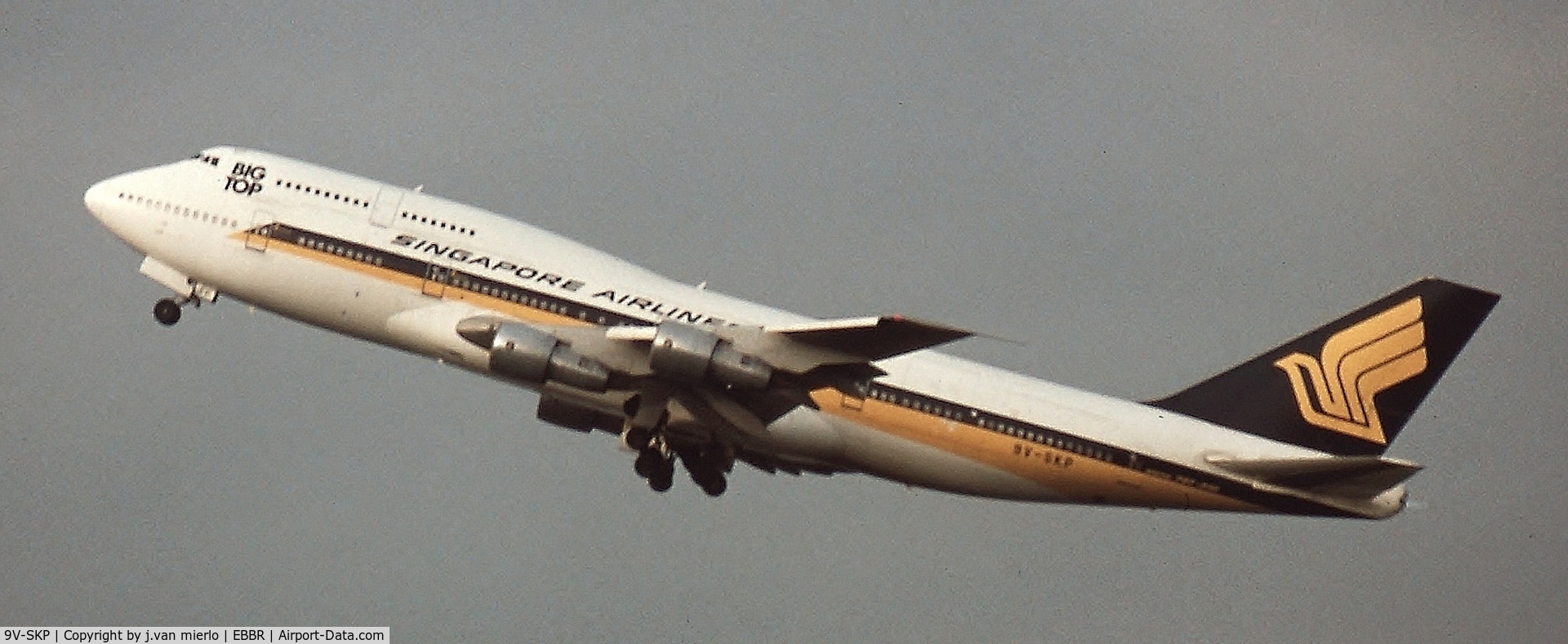 9V-SKP, 1987 Boeing 747-312 C/N 23769, Climbing out of Brussels 25R
