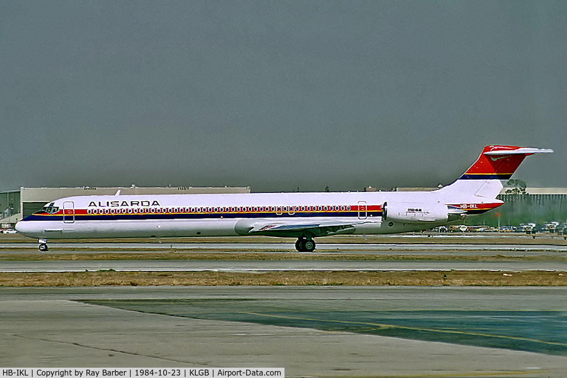 HB-IKL, 1984 McDonnell Douglas MD-82 (DC-9-82) C/N 49248, HB-IKL   McDonnell Douglas DC-9-82 (MD82) [49248) (Alisarda) Long Beach~N 23/10/1984. From a slide.