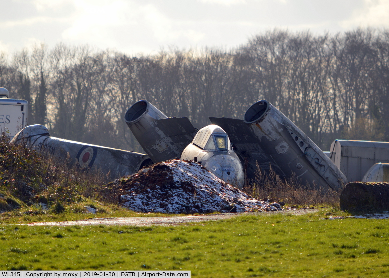 WL345, Gloster Meteor T.7 C/N Not found WL345, Dismantled Gloster Meteor T.7 ex Parkhouse Aviation now dumped near the glider trailers at Wycombe Air Park. Very sad.